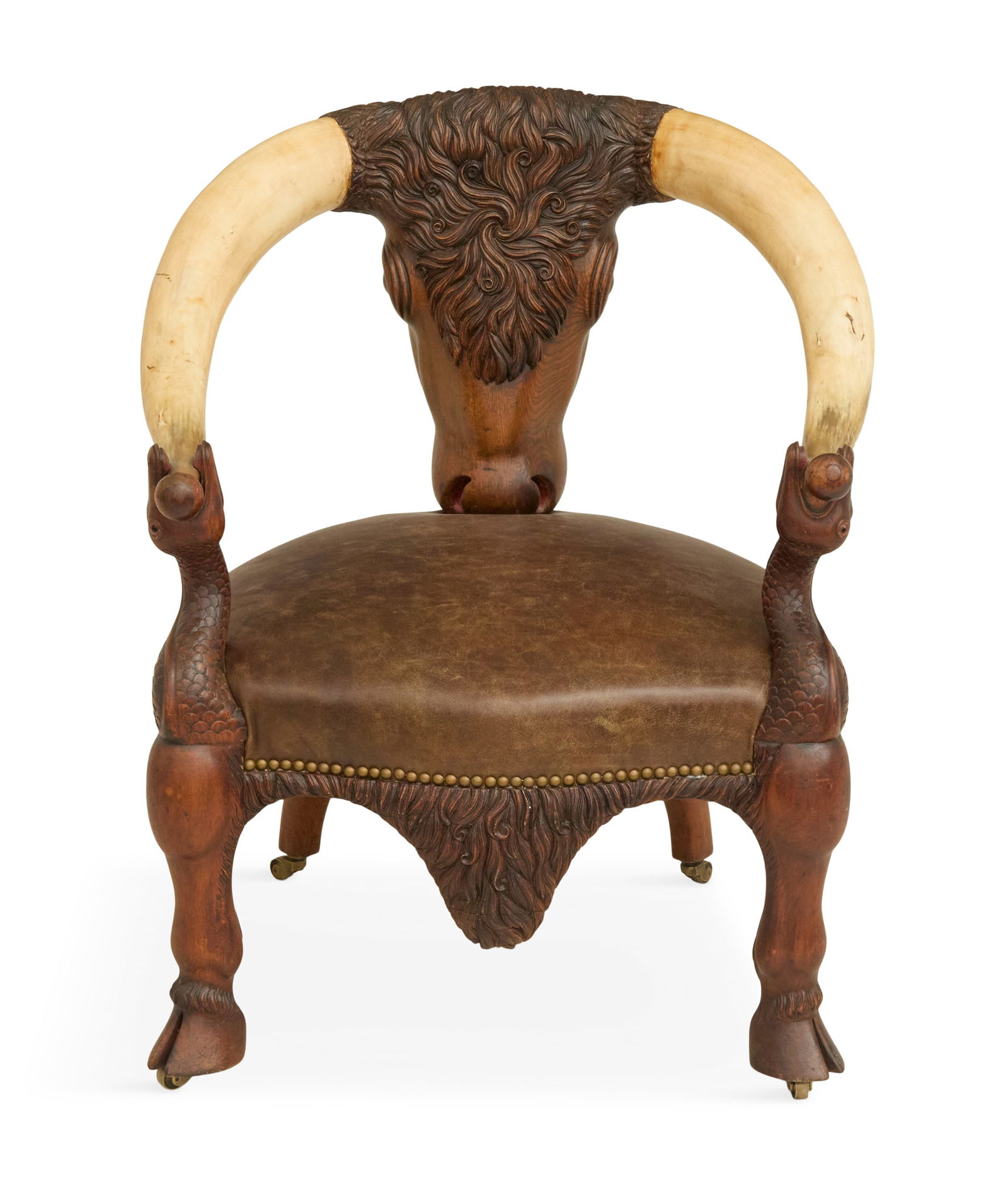 Fine and Rare Carved Oak Steer Horn Chair: Fine and Rare Carved Oak Steer Horn Chairearly 20th century, the back in the form of a steer's head with its horns curving around to form the arms, terminating in the clenched mouths of serpents, form