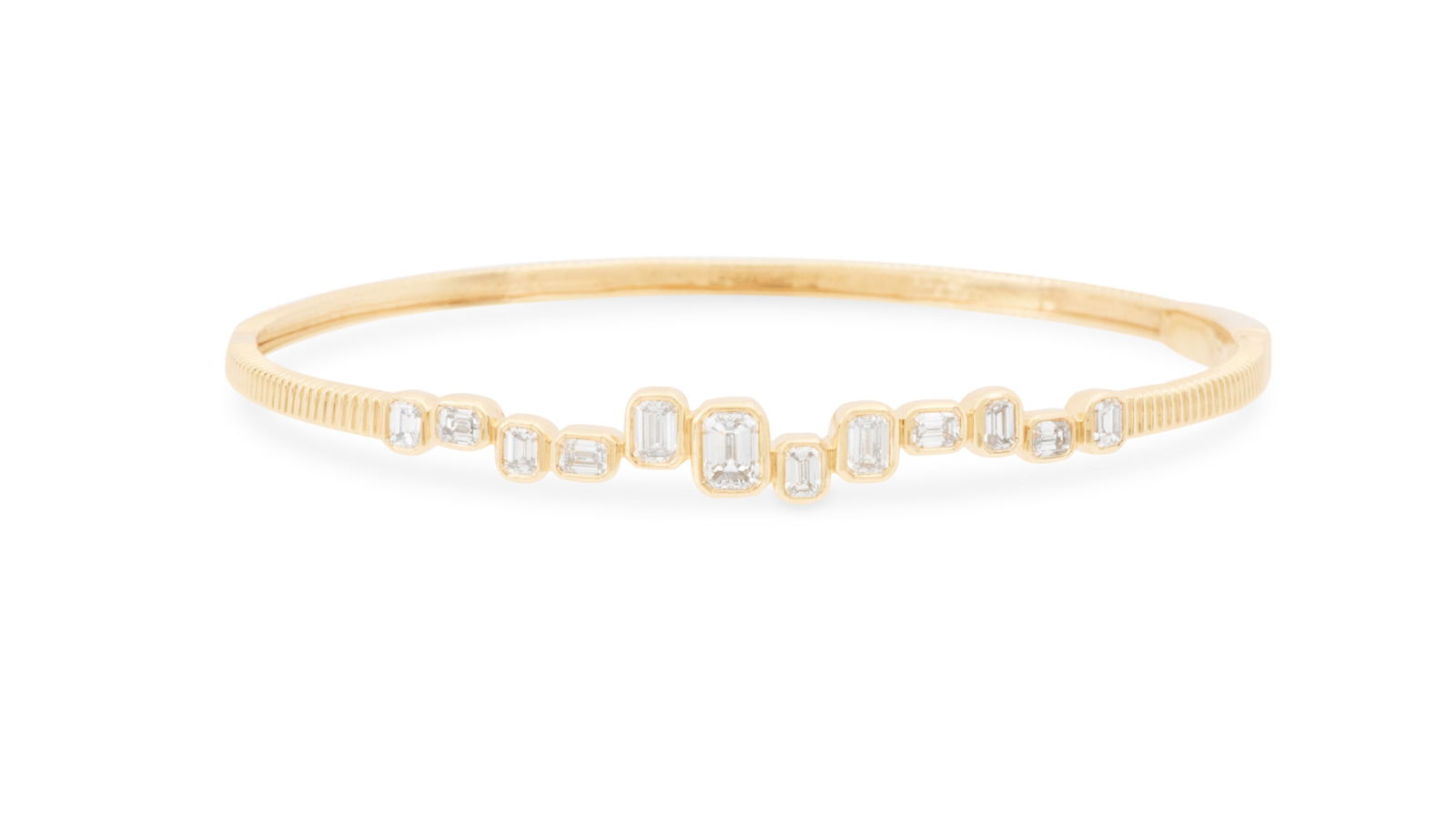 Diamond Bangle Bracelet: Diamond Bangle Bracelet14k yellow gold, the bracelet mounted with emerald-cut diamonds weighing approximately 1.46 carats in total.inside circumference 6-1/2", total weight 8.2 grams