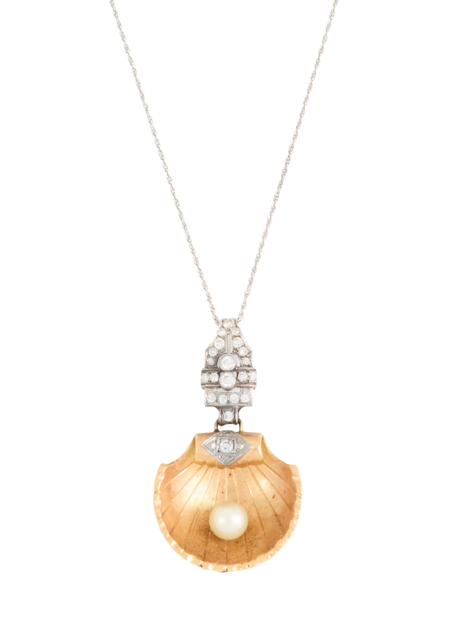 Diamond and Pearl Pendant Necklace: Diamond and Pearl Pendant Necklace18k yellow gold/14k white gold, the necklace set with an 18k yellow gold scallop shell pendant mounted with a cultured pearl measuring 7.00mm in diameter, accented wi