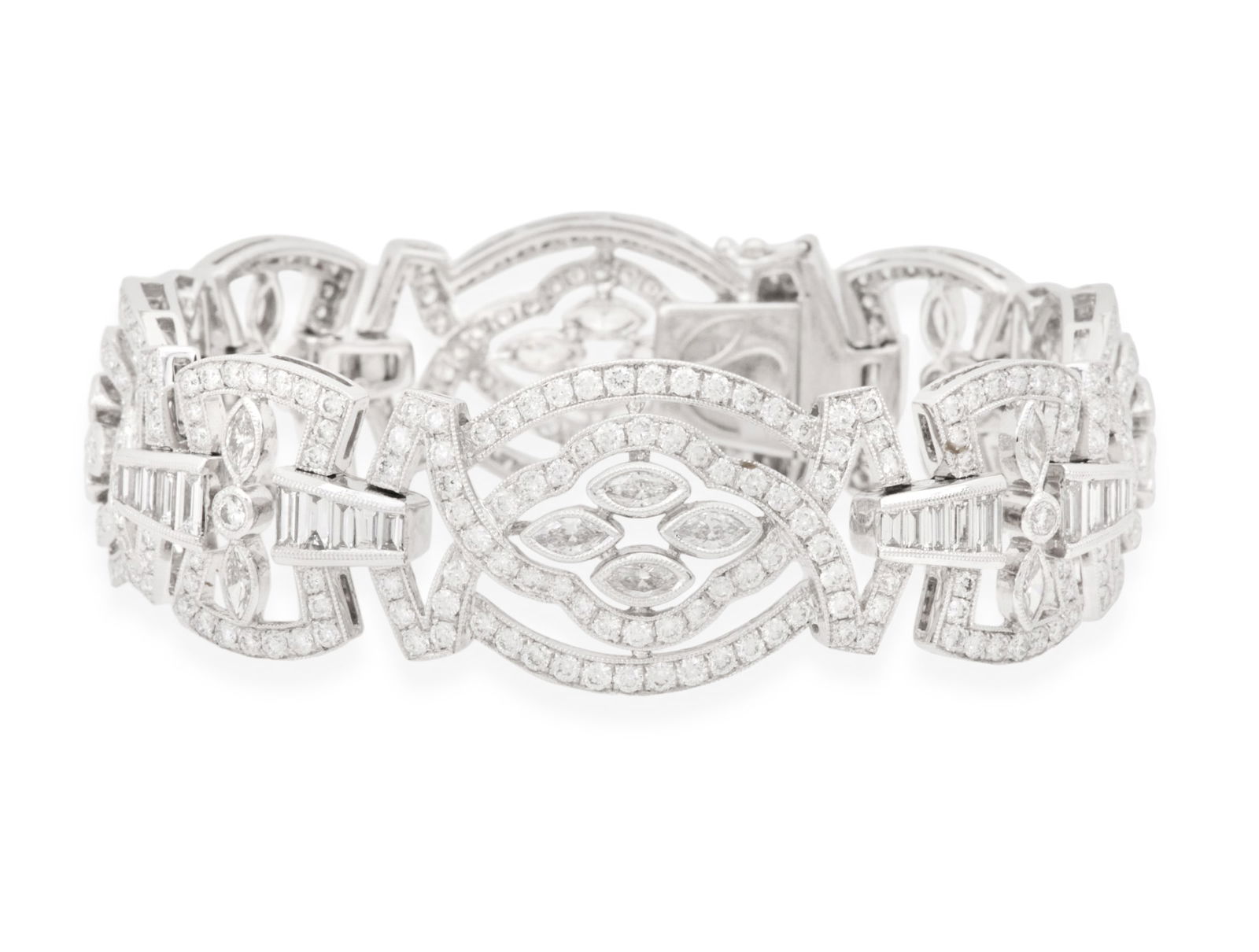 Diamond Bracelet: Diamond Bracelet 18k white gold, the bracelet mounted with marquise-, baguette- and round brilliant-cut diamonds weighing approximately 10.50 carats in total. w. 3/4", l. 7", total weight 44.6 grams
