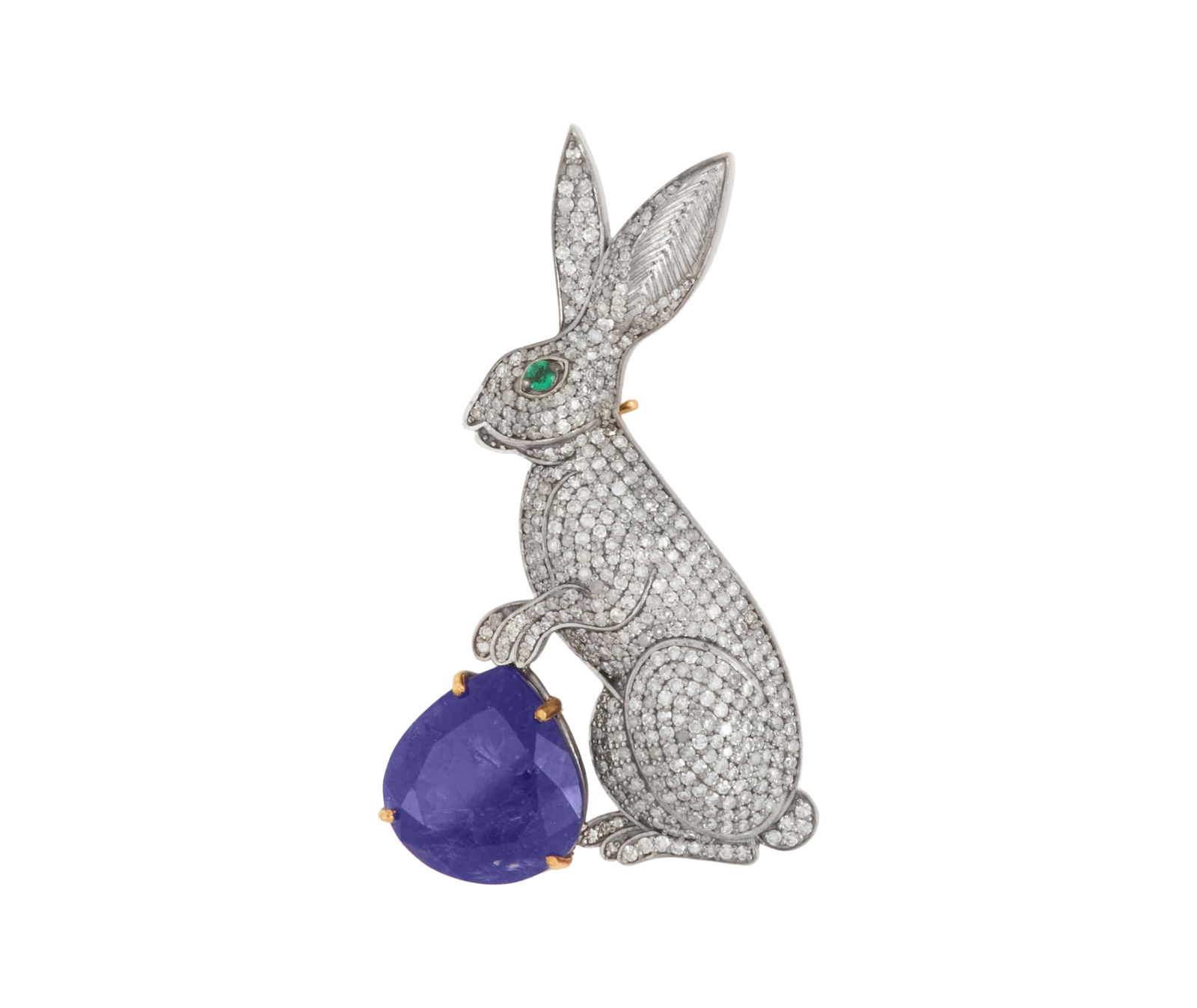 Tanzanite and Diamond Bunny Brooch/Pendant: Tanzanite and Diamond Bunny Brooch/Pendant 14k yellow gold, sterling silver, the brooch mounted with a pear-cut tanzanite weighing approximately 12.50 carats, accented by round brilliant-cut diamonds