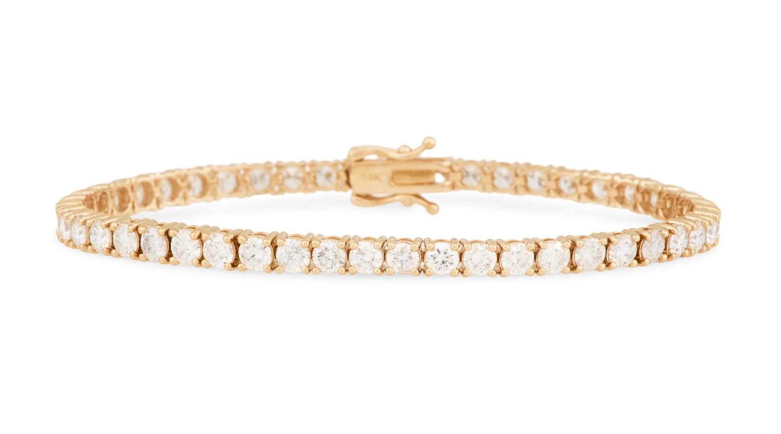 Diamond Tennis Bracelet: Diamond Tennis Bracelet14k yellow gold, the bracelet mounted with round brilliant-cut diamonds weighing approximately 7.25 carats in total.l. 7", total weight 11.9 grams