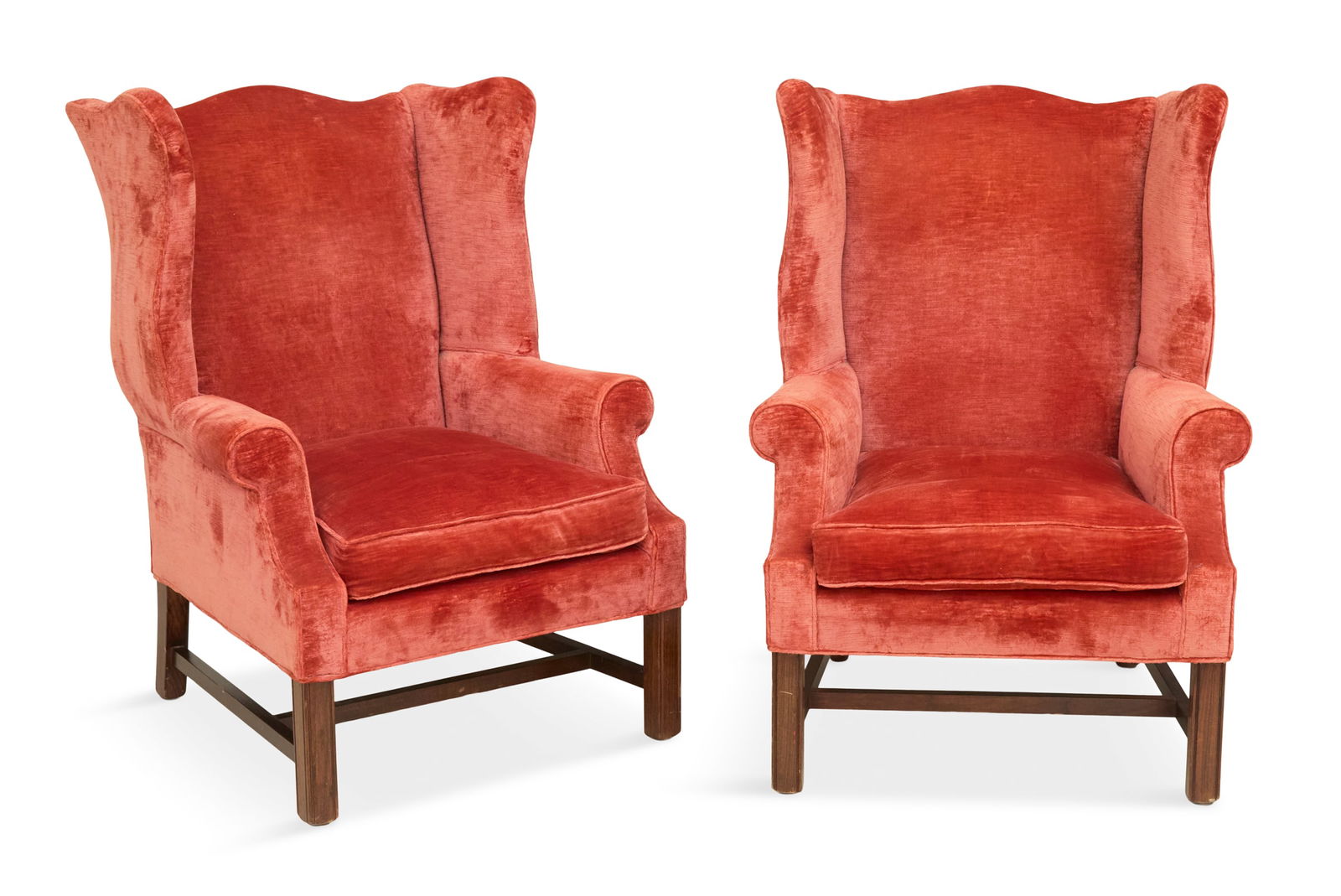 Pair of George III-Style Mahogany Wing Chairs: Pair of George III-Style Mahogany Wing Chairslate 19th century, of traditional form, each with a loose seat cushion, raised on Marlborough legs joined by an H-form stretcher, upholstered in Scalamandr