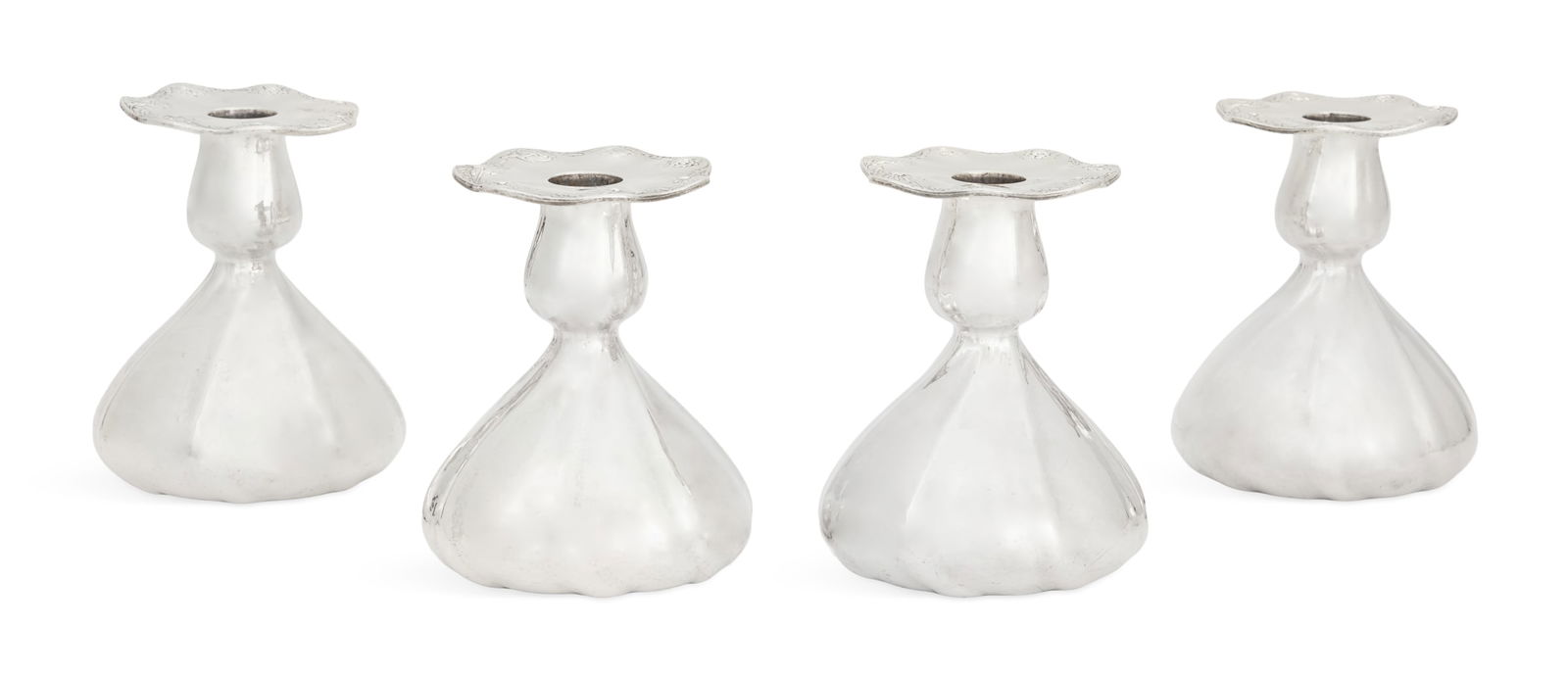 Four Gorham Martele Silver Candlestands: Four Gorham Martele Silver Candlestands1930, Providence, Rhode Island, .9584 silver, each with a spiraled, serpentine-lobed, bulbous base with waisted nozzle and wide wavy lobed rim, with hammered fin