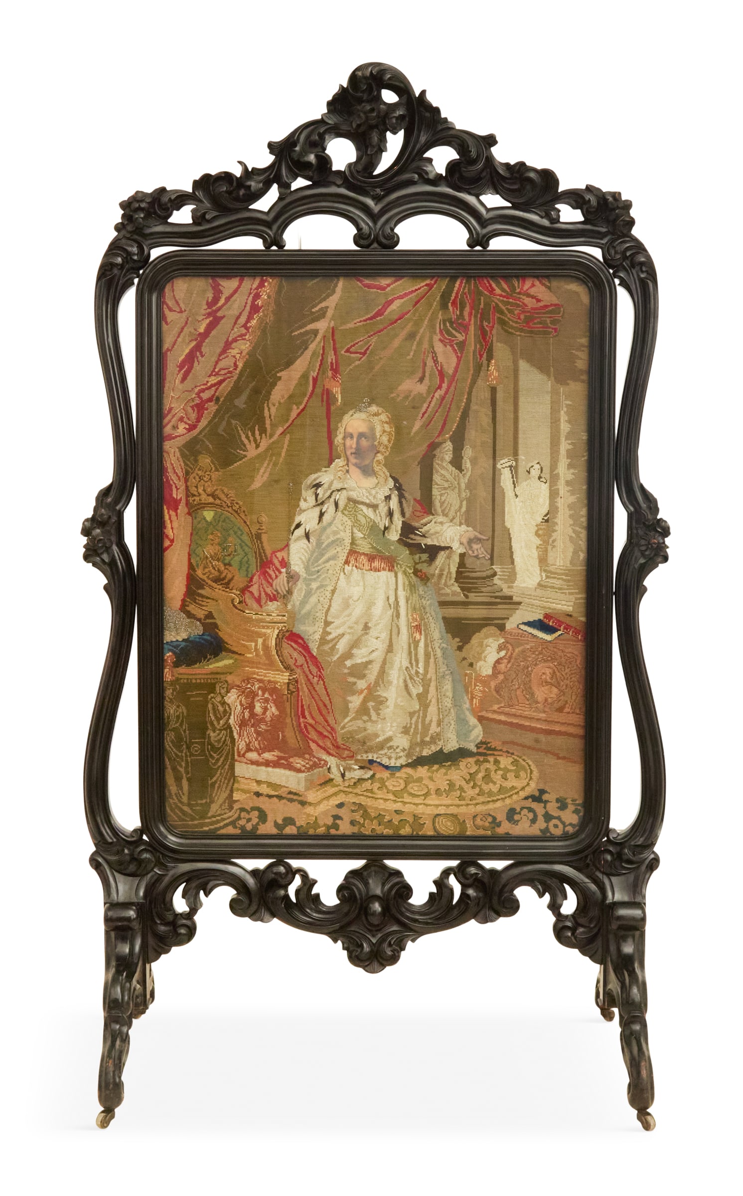 English Ebonized Rococo Revival Firescreen: English Ebonized Rococo Revival Firescreenmid-19th century, set with a rich needlepoint panel of Madame de Pompadour, the unusually large screen with a pierced crest carved with roses and scrollwork,