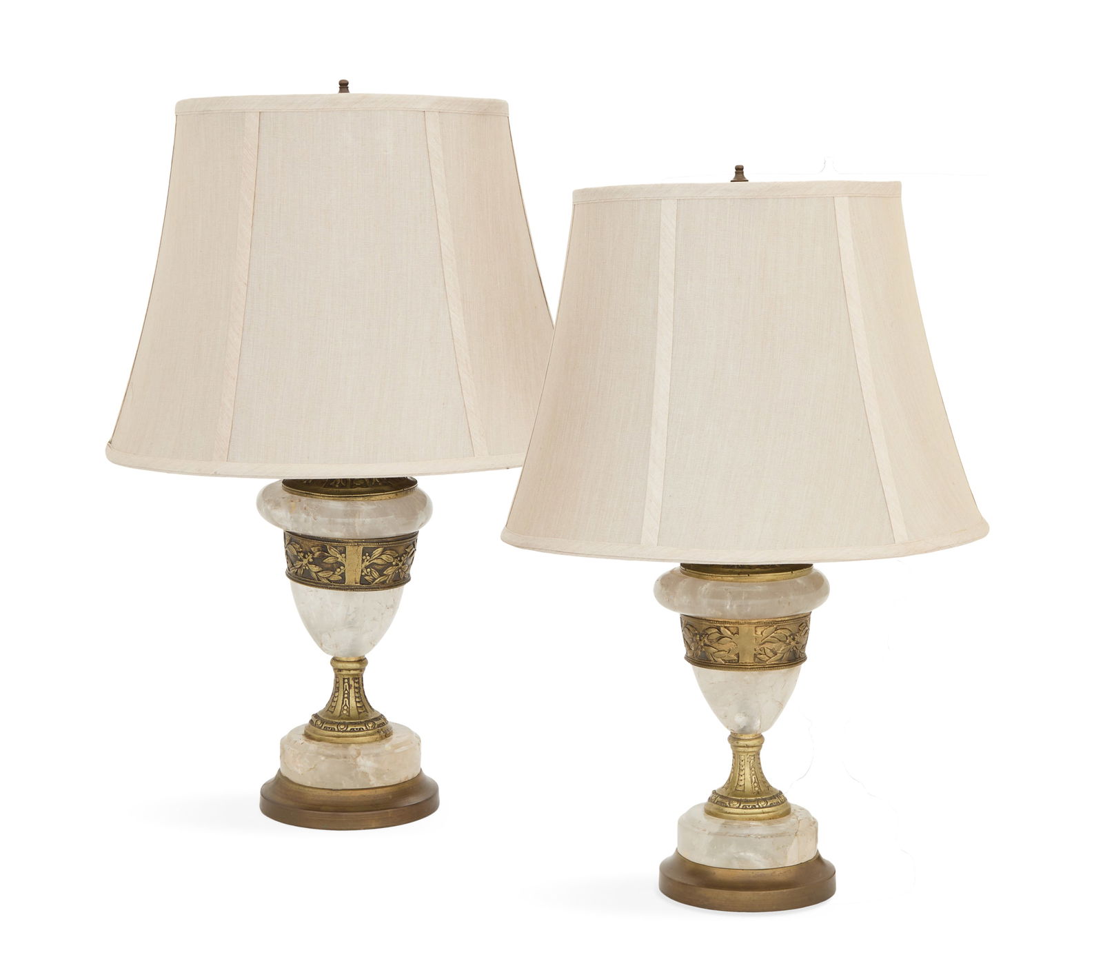 Pair of French Rock Crystal and Bronze Lamps: Pair of French Rock Crystal and Bronze Table Lamps first half 20th century, the vasiform rock crystal bases with bronze fittings decorated with bellflowers and scrolling vines, electrified and fitted