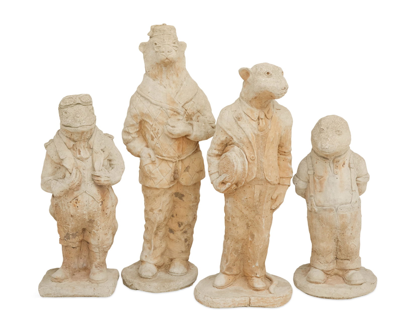 Four "Wind in the Willows" Garden Figures: Four The Wind in the Willows Cast-Stone Garden Figures 20th century, the figures depicting Mr. Toad, Ratty, Badger and Mole, all dressed in amusing costumes. h. 28" to 36", w. 10" to 12", d. 8-1/2"