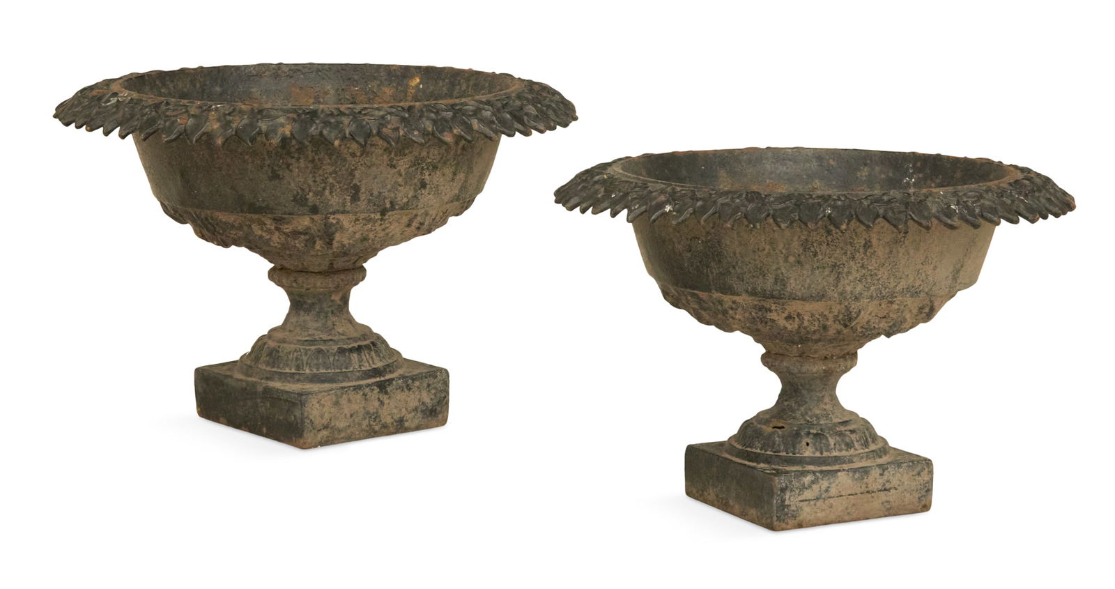 Pair of Cast-Iron Garden Urns: Pair of Cast-Iron Garden Urns 19th century, the rims molded with flowers, the lower outside edges molded with grapes, on tapered bases, raised on square plinths. h. 14-1/2", dia. 22"