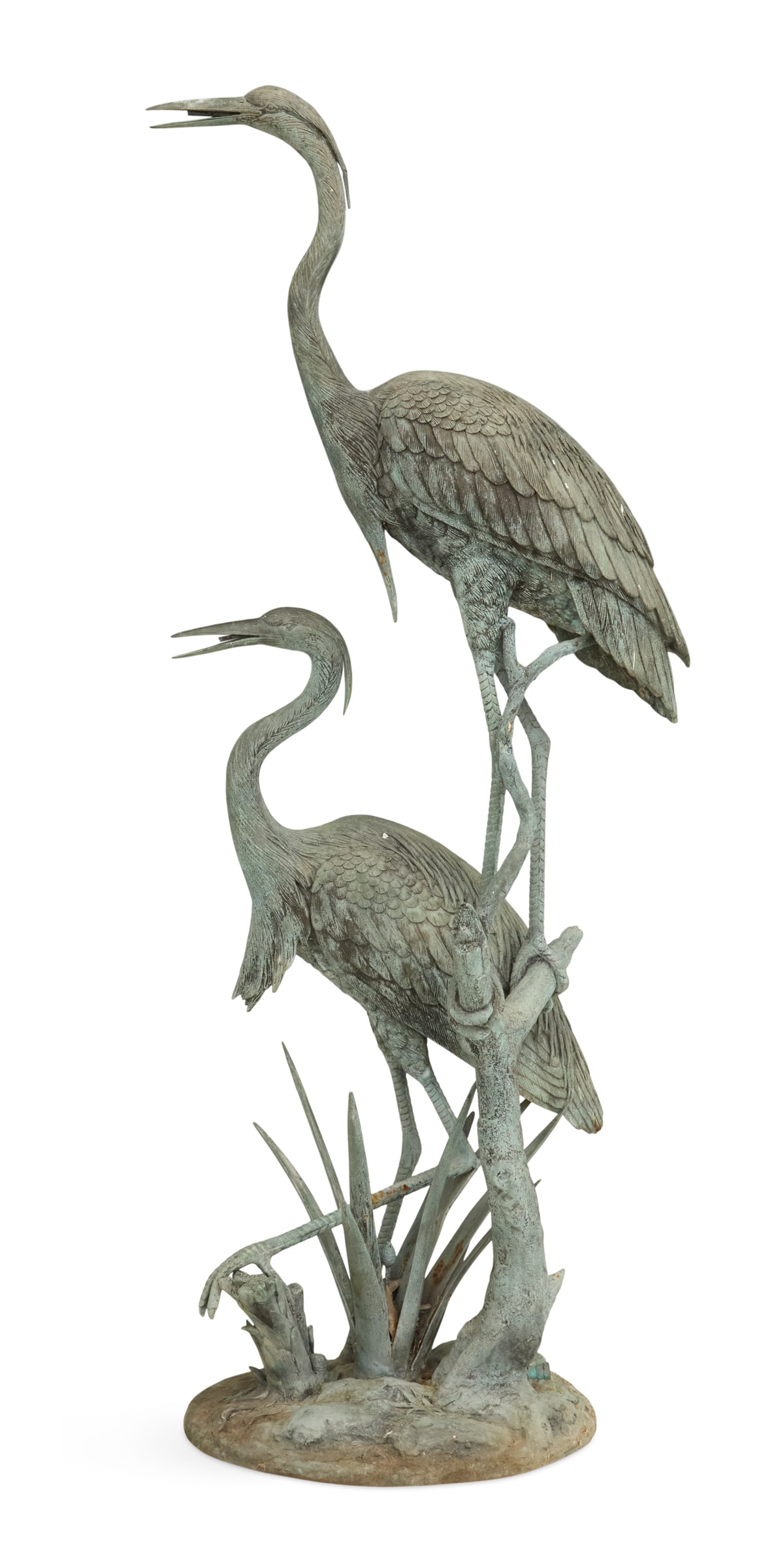 Bronze Egret Fountain: Bronze Egret Fountain comprised of two egrets, both piped to spout water from their bills, the taller one on a driftwood stump, above an integral circular base modeled with plants. h. 75-3/4", w.