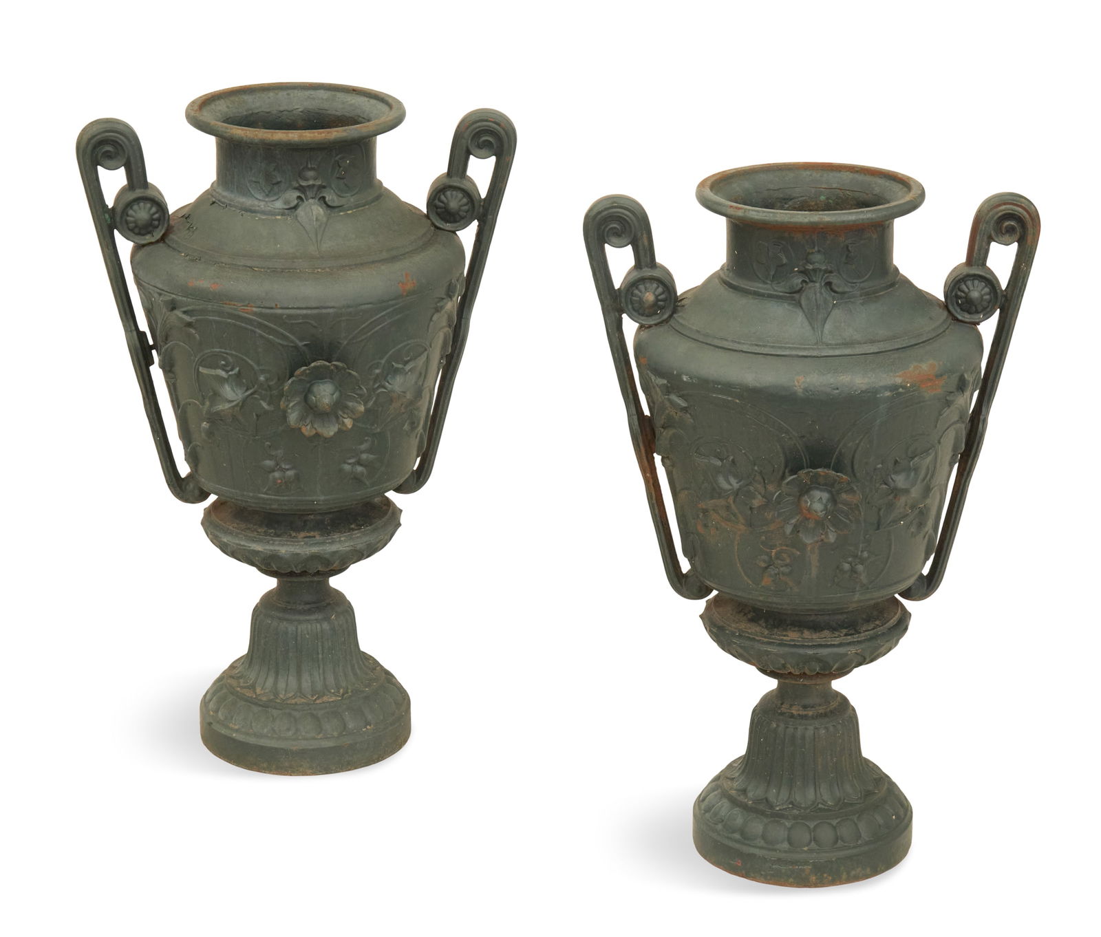 Pair of Cast-Iron Garden Urns: Pair of Cast-Iron Garden Urns in the Neo-Grec Taste ca. 1900, the tapered urns decorated with applied sunflowers on a ground of bas-relief ivy vines, set with handles decorated with medallions and
