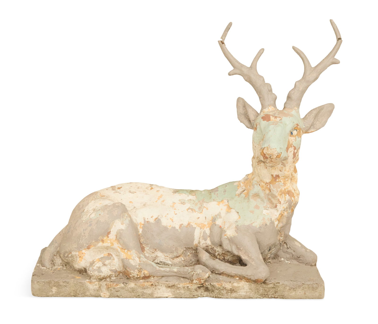 Cast-Stone Recumbent Stag: Cast-Stone Recumbent Stag ca. 1900, the painted stag on a rectangular plinth. h. 39", w. 40", d. 16-1/4"