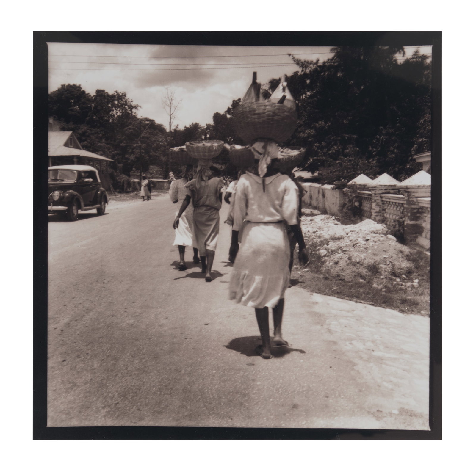 Paul Ninas (American/Louisiana, 1903-1964): Paul Ninas(American/Louisiana, 1903-1964)"Women on Their Way to Market, Dominica, Lesser Antilles"gelatin silver printlater printing.Unframed.20" x 20" Provenance: Collection of the artist; Colle