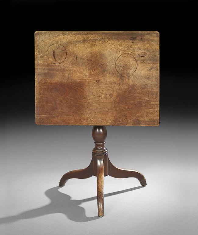George III-Style Mahogany Tilt-Top Stand: George III-Style Mahogany Tilt-Top Stand, mid-19th century, the rectilinear single-board top on a vasiform tripodal pedestal, h. 28", w. 28", d. 20-3/4".
