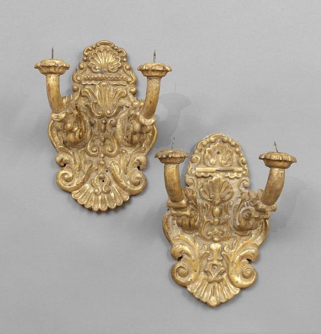 Pair of Giltwood Two-Light Sconces: Pair of Giltwood Two-Light Sconces, in the Spanish Baroque style, carved with shells and scrollwork, h. 18", w. 11", d. 11-1/4".
