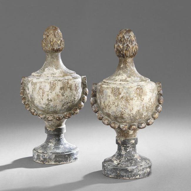 Pair of Neoclassical-Style Painted Wooden Urns: Pair of Neoclassical-Style Carved and Painted Wooden Urns, decorated with swags of beadwork, in a worn finish, h. 16-3/4", dia. 5-3/4".