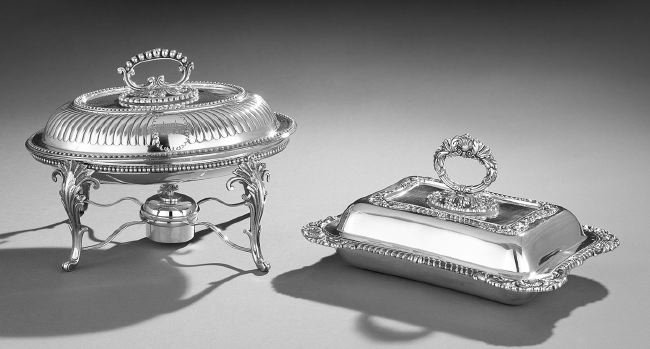 Two English Silverplate Entree Dishes: Two English Silverplate Entree Dishes, late 19th and early 20th century, including a Victorian oval example on stand by Atkin Brothers, Sheffield, h. 9", l. 12"; and an Edwardian rectangular example b