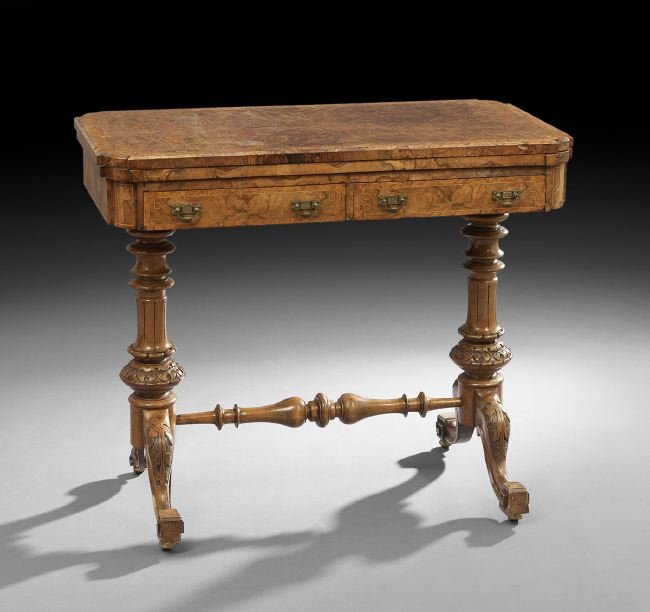 Continental Burled Elm Games Table: Continental Burled Elm Games Table, third quarter 19th century, the highly figured fold-over top over a frieze fitted with a pair of drawers, h. 29", w. 34-1/2", d. 18-1/4", extended l. 36-1/2".
