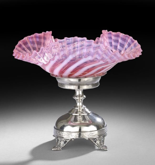 American Silverplate and Glass Fruit Stand: American Aesthetic Period Silverplate and Glass Fruit Stand, fourth quarter 19th century, Pelton Bros., St. Louis, Missouri, the silverplate stand with a domed base raised on four palmette feet and fi