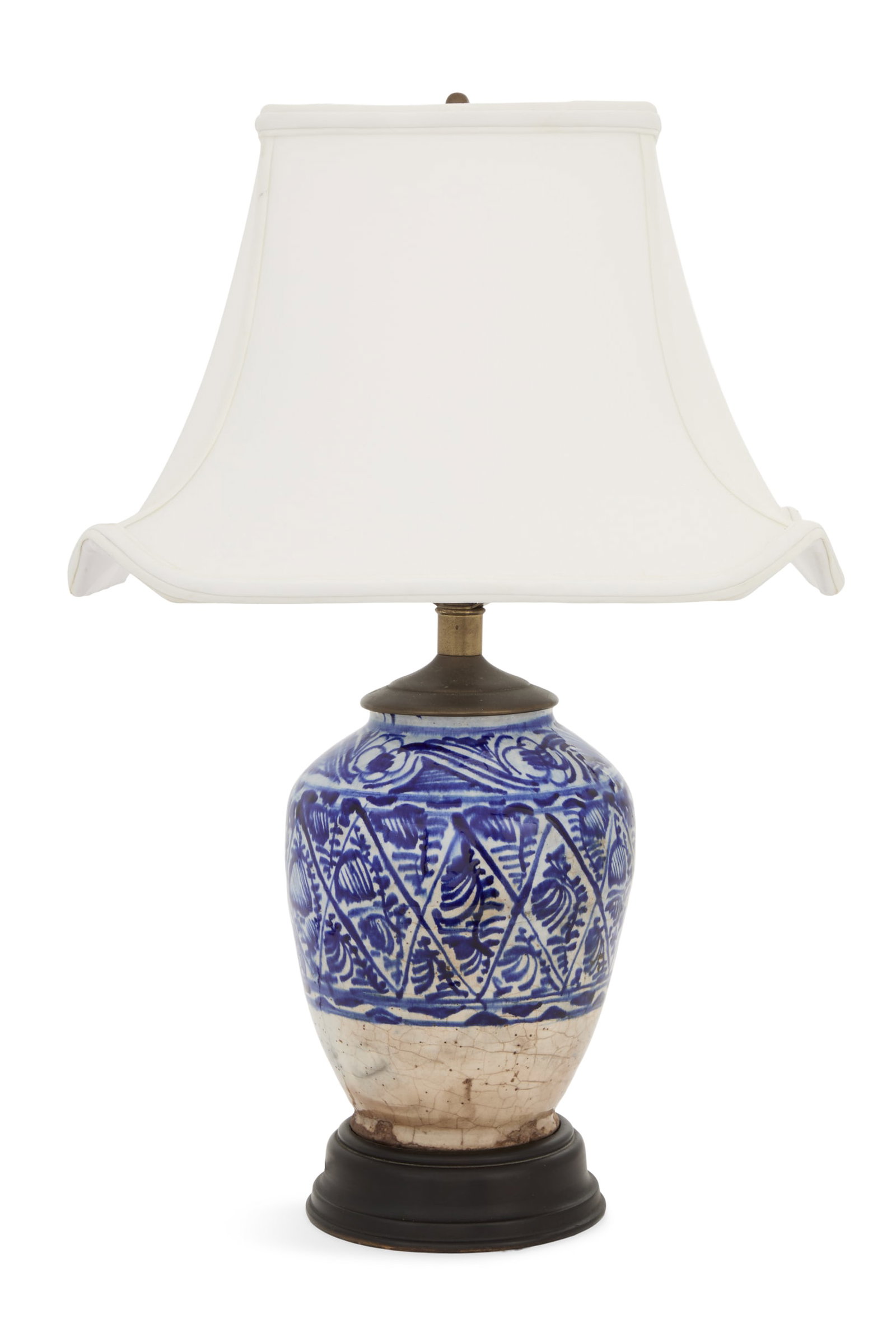Persian Safavid Ginger Jar Lamp: Persian Safavid Ginger Jar Lamp possibly 17th or 18th century, the pottery lamp with free-hand cobalt decoration, on an ebonized base, fitted with a lampshade. h. 25-1/4", dia. 17" Provenance: The Est
