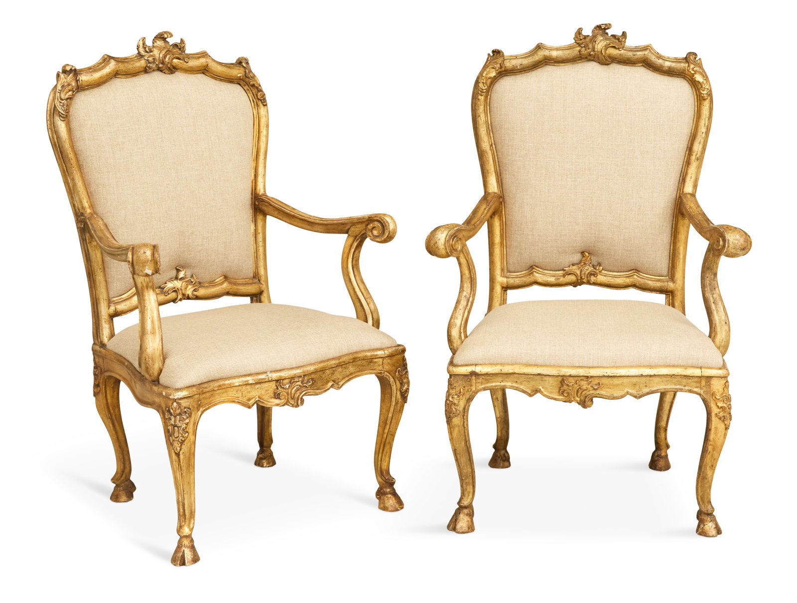 Pair of Venetian Giltwood Armchairs: Pair of Venetian Giltwood Armchairs 18th century, with carved frames and scrolled hand grips, with padded backs and slip seats, raised on cabriole legs ending in cloven hoof feet. h. 45", seat h. 18-1