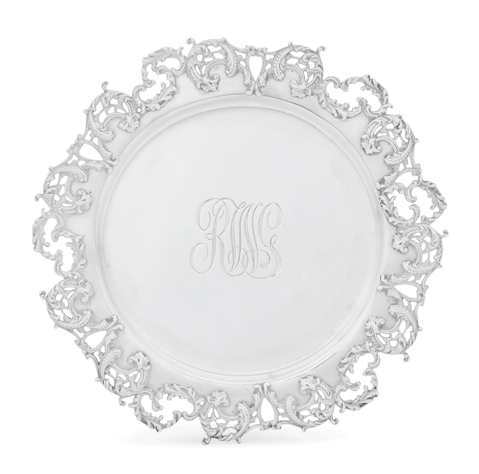 American Sterling Silver Waiter: American Sterling Silver Waiter second quarter 20th century, unmarked, circular with elaborate cast openwork rococo scroll rim, monogrammed "RWG". dia. 9-1/4"; 11.70 t. oz. Provenance: The Estate of S