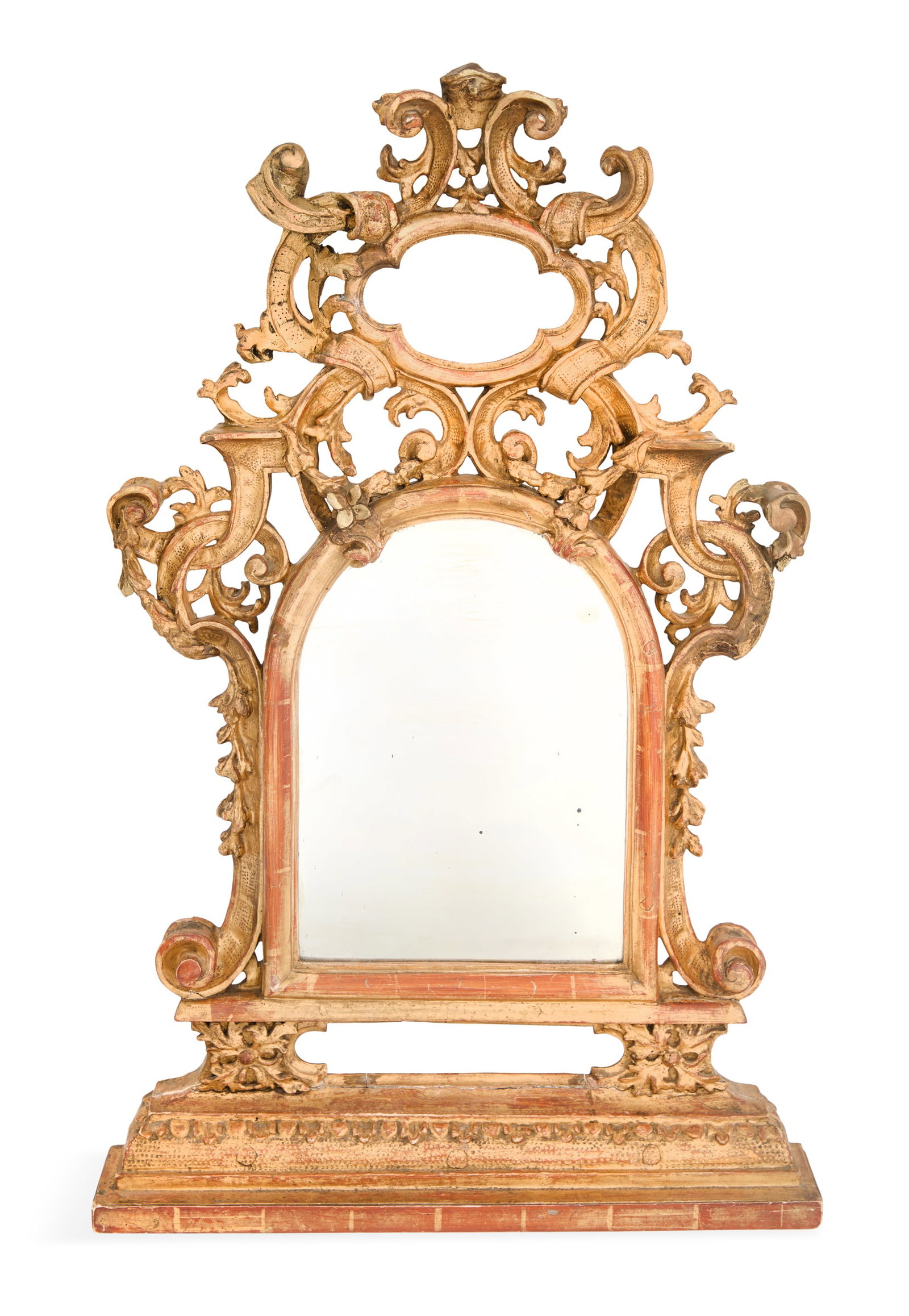 Continental Giltwood Reliquary: Continental Giltwood Reliquary 19th century, now mounted with a mirror glass in a delicate pierced surround decorated with ribbons and scrollwork, accented with flowers and trailing leaves on the side