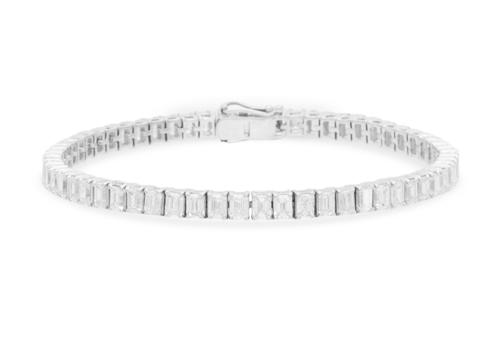 Emerald-Cut Diamond Bracelet: Emerald-Cut Diamond Bracelet 18k white gold, the bracelet mounted with emerald-cut diamonds weighing approximately 8.65 carats in total. l. 7", total weight 13.8 grams