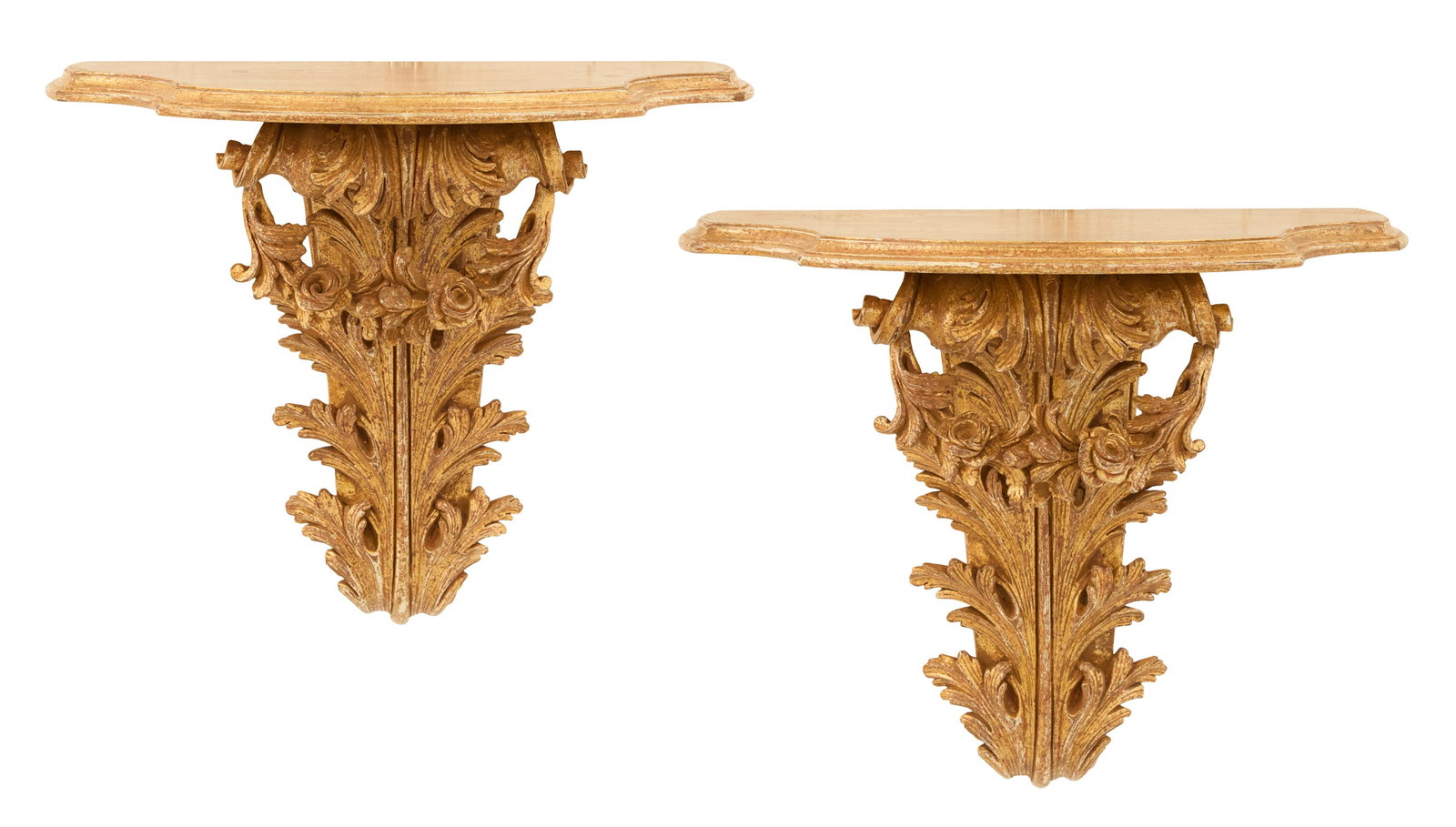 Pair of Neoclassical-Style Giltwood Brackets: Pair of Giltwood Brackets in the Neoclassical Taste 20th century, the serpentine shelves on scrolled, acanthus-carved backplates, accented with swags of roses. h. 18-3/4", w. 22-1/2", d. 12"