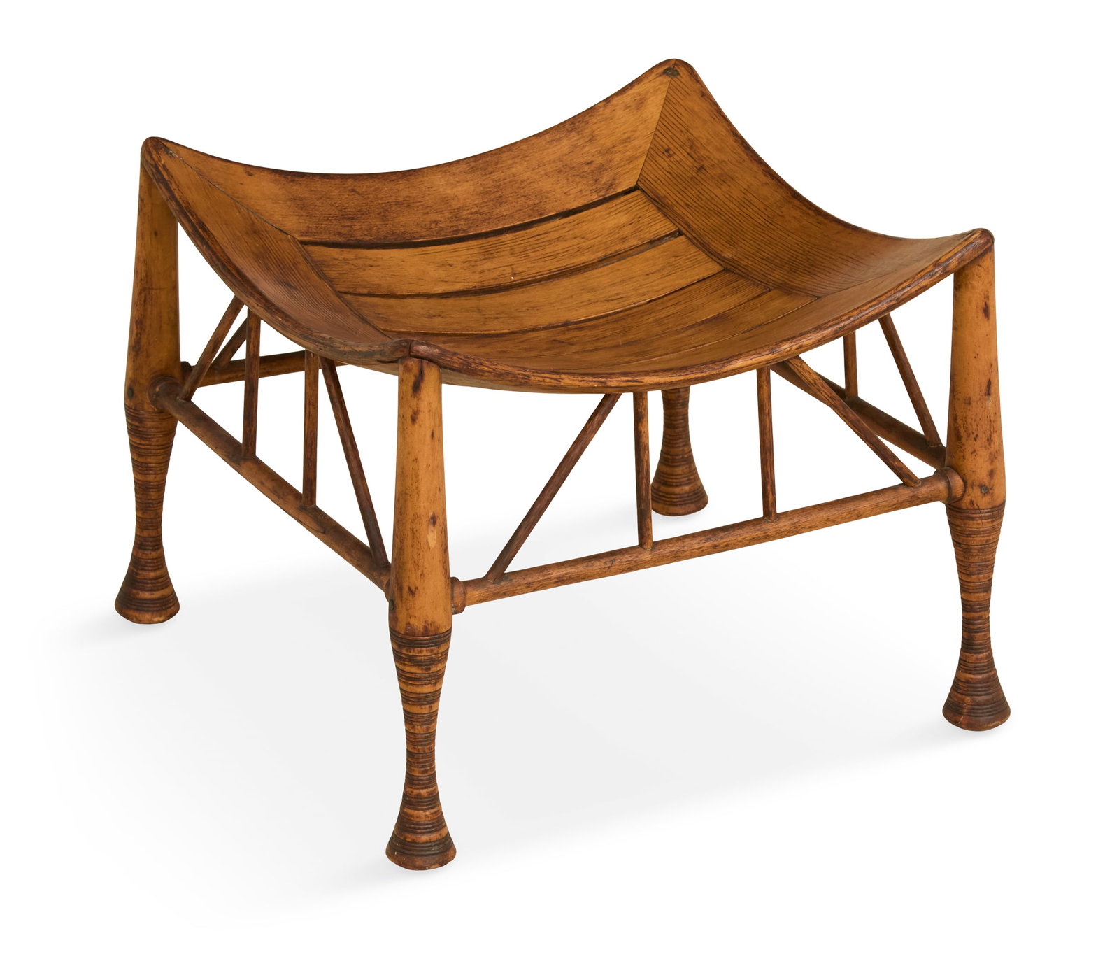 Egyptian Revival Turned and Bentwood Thebes Stool: Egyptian Revival Turned Maple and Bentwood Thebes Stool early 20th century, English, the square in-curved slat seat raised on bobbin-turned legs and joined by turned stretchers. h. 14-1/2", w. 17", d.