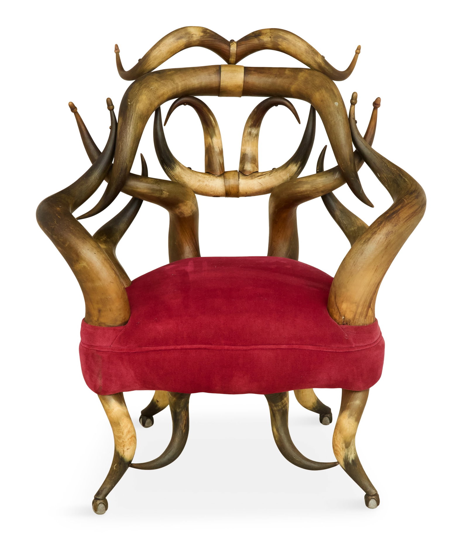 Texas Longhorn Armchair: Texas Longhorn Armchair 20th century, composed of multiple pairs of horns, the tips finished as carved acorns, with a padded seat covered in rose velvet. h. 37", seat h. 17", w. 32", d. 22"
