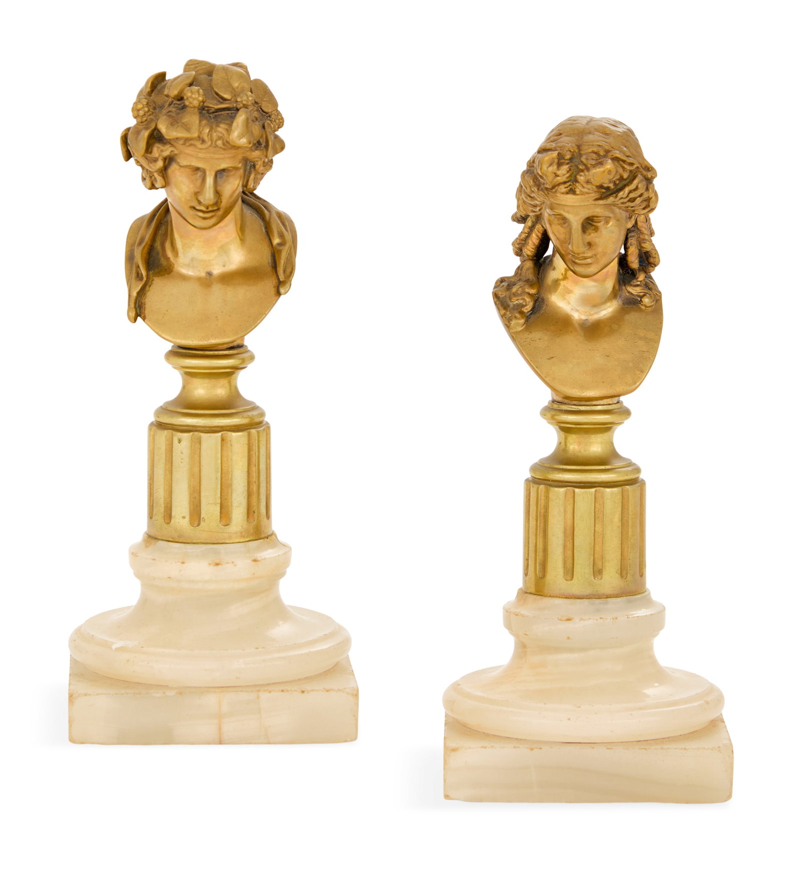 Pair of French Bronze Neo-Grec Busts: Pair of French Bronze Neo-Grec Busts third quarter 19th century, the busts of Dionysus and Antinous, on fluted bases, raised on turned alabaster plinths. h. 7", w. 3", d. 3" Provenance: The collection