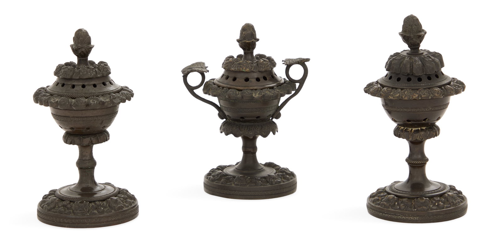Three English Patinated Bronze Incense Burners: Three English Patinated Bronze Incense Burners early 19th century, molded with fruit and flowers and accented with engine turning, the collection including a pair of burners and a similar burner with 