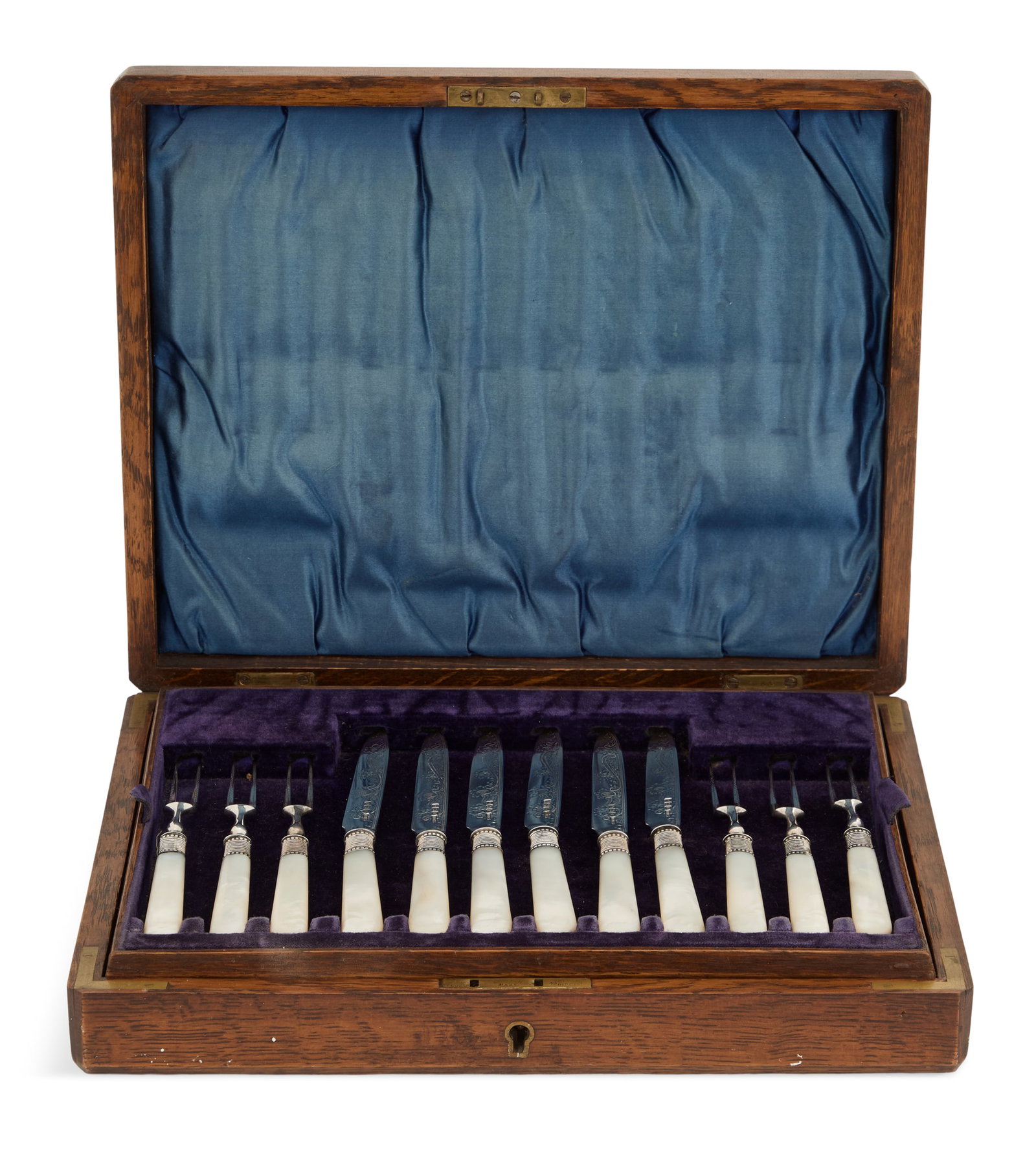 George V Cased Dessert Set: George V Cased Sterling Silver and Mother-of-Pearl Dessert Set hallmarked Sheffield, 1912-1913, by James Dixon & Sons, including twelve two-tined forks, l. 6", and eleven pointed knives with engraved 