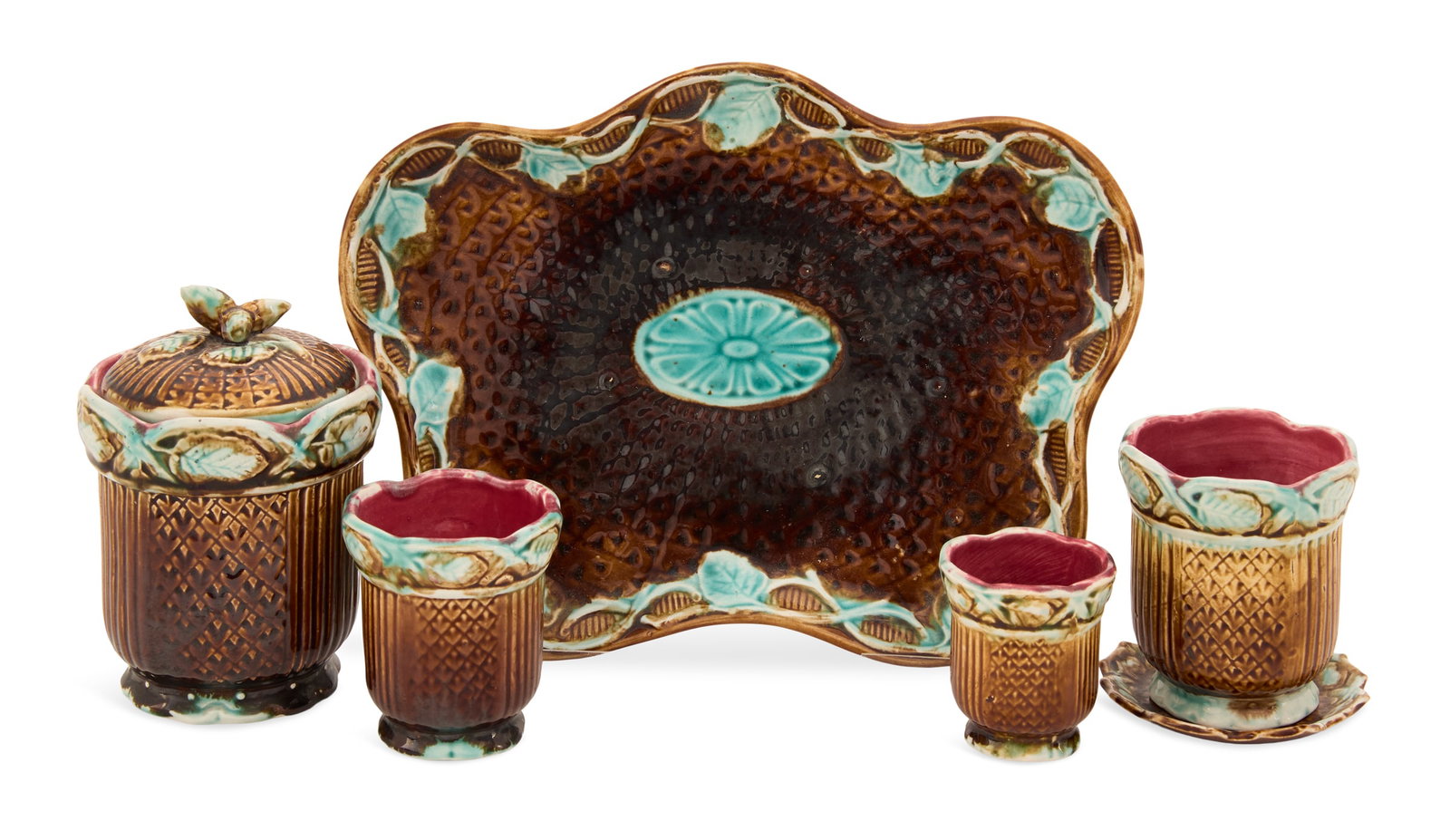 French Majolica Jam Set: French Majolica Jam Set fourth quarter 19th century, the set including a tray, l. 11-1/4", w. 8-1/4", three graduated open containers, h. 3-1/2" to 3-3/4", dia. 2-1/4" to 3-1/4", a covered container, 