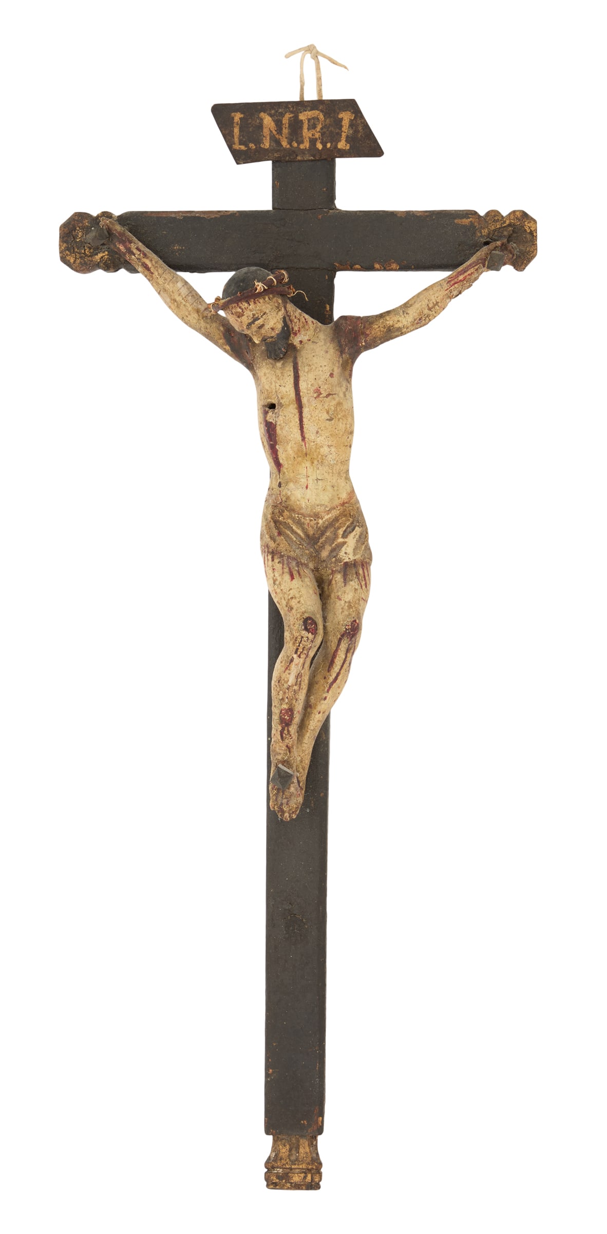Italian Painted Wood and Tole Crucifix: Italian Painted Wood and Tole Crucifix 19th century, the painted cross with carved giltwood accents, with a tole banner marked "I.N.R.I." at the top, the carved body of Jesus with a crown composed of 