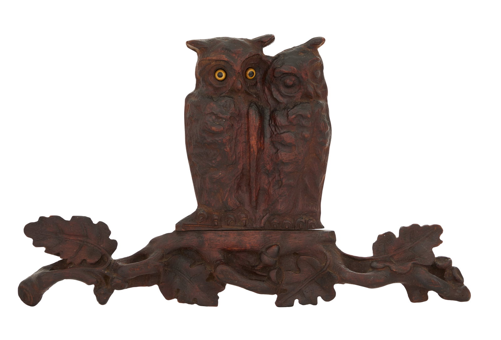 Swiss Black Forest Carved Wooden Owl Plaque: Swiss Black Forest Carved Wooden Owl Plaque late 19th century, carved with two owls, one with glass eyes, perched on an oak branch carved with oak leaves and acorns. h. 11-1/2", w. 21-1/2"