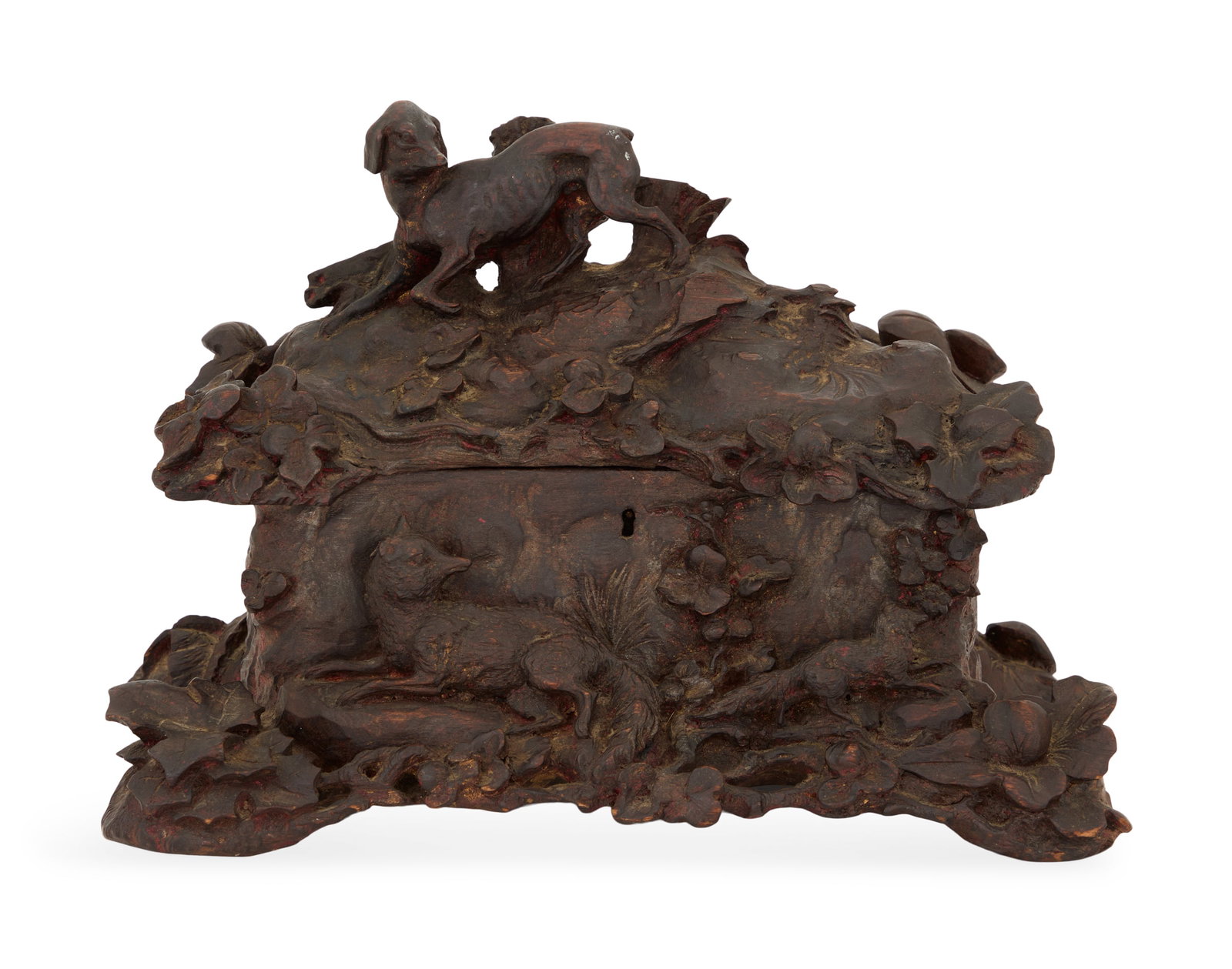"Fox and Hound" Black Forest Jewel Casket: Charming Black Forest "Fox and Hound" Jewel Casket 19th century, with a hound on the cover and a fox on the base, against a lush carved ground of ivy leaves. h. 9", w. 13", d. 8" Provenance: Kevin