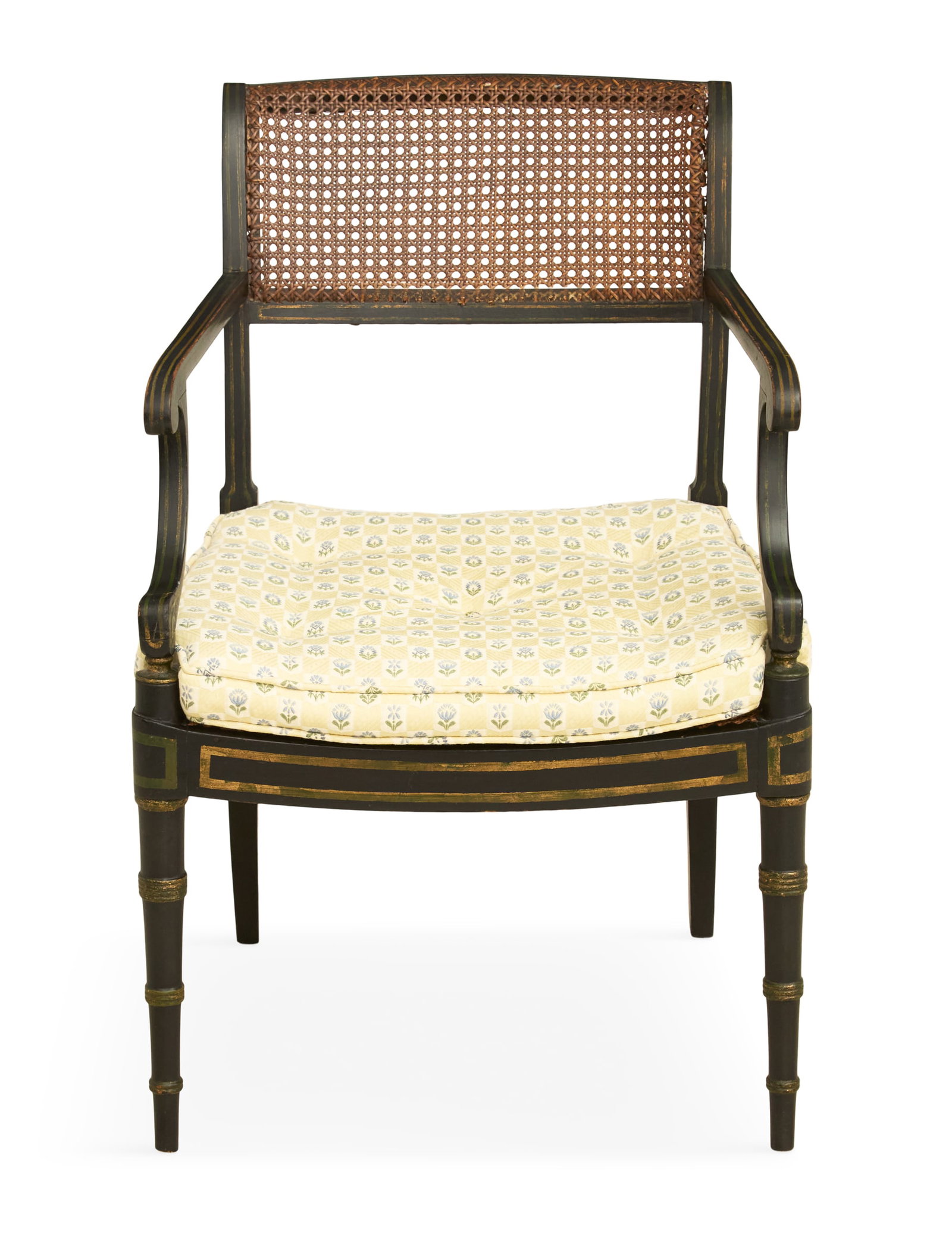 Regency Ebonized, Caned and Stenciled Armchair: Regency Ebonized, Caned and Stenciled Armchair 19th century, the frame with gilt stenciling, the back with a caned panel joined by scrolled arms and curved arm supports to a caned seat and turned