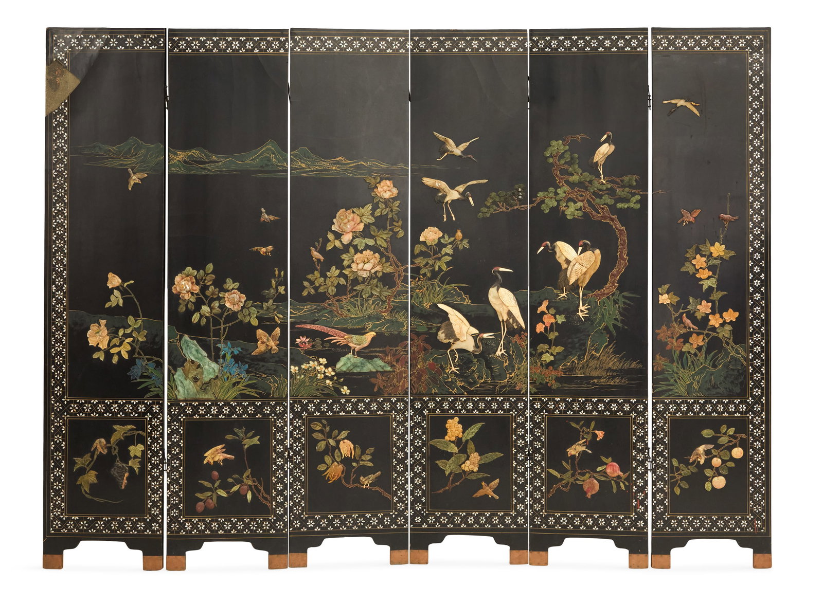 Chinese Six-Panel Coromandel Screen: Chinese Six-Panel Coromandel Screen mid-20th century, decorated with carved, raised hardstone birds in trees, on a black lacquer ground, with foliate mother-of-pearl borders, the lower panels