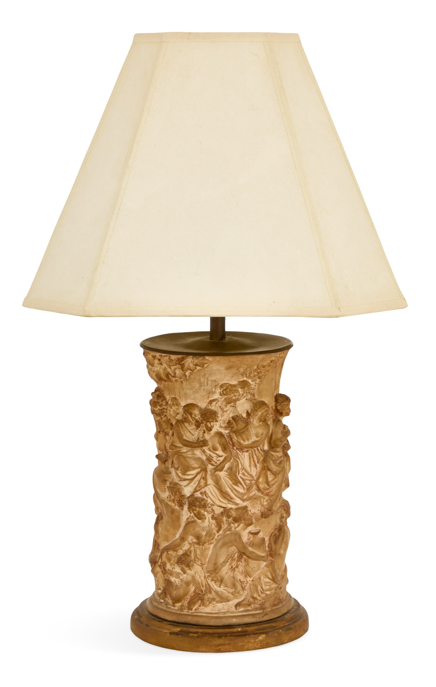 Stoneware Vase Lamp: Stoneware Vase Lamp 19th/20th century, the cylindrical lamp lushly molded with Bacchanalian figures, between a brass cap and giltwood base, fitted with a lampshade. h. 24", w. 14", d. 14" Provenance: