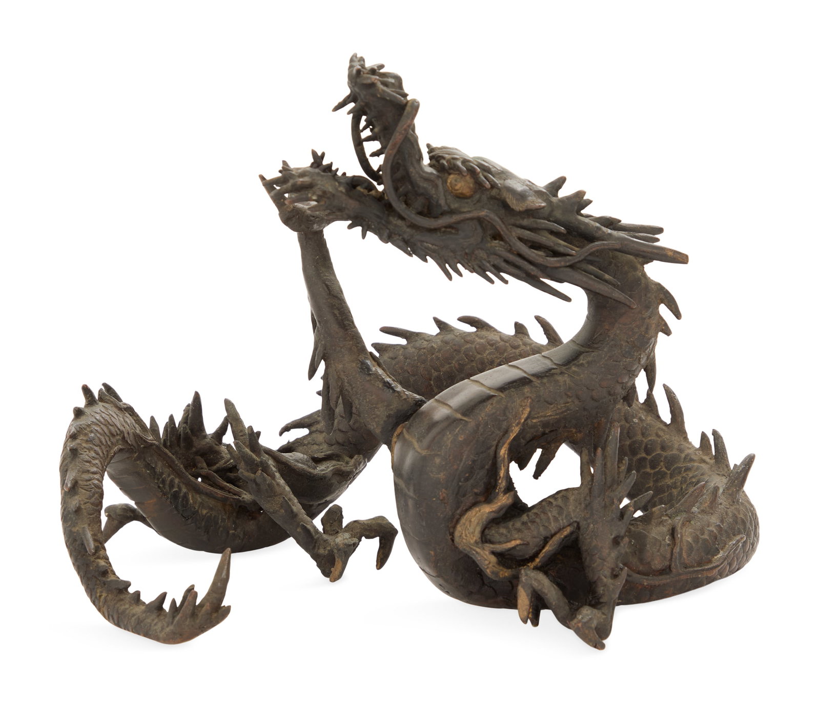 Japanese Meiji Period Bronze Dragon: Japanese Meiji Period Bronze Dragon late 19th century, the menacing, swirling dragon retaining a rich brown-patinated surface. h. 8-1/4", w. 9", d. 8"