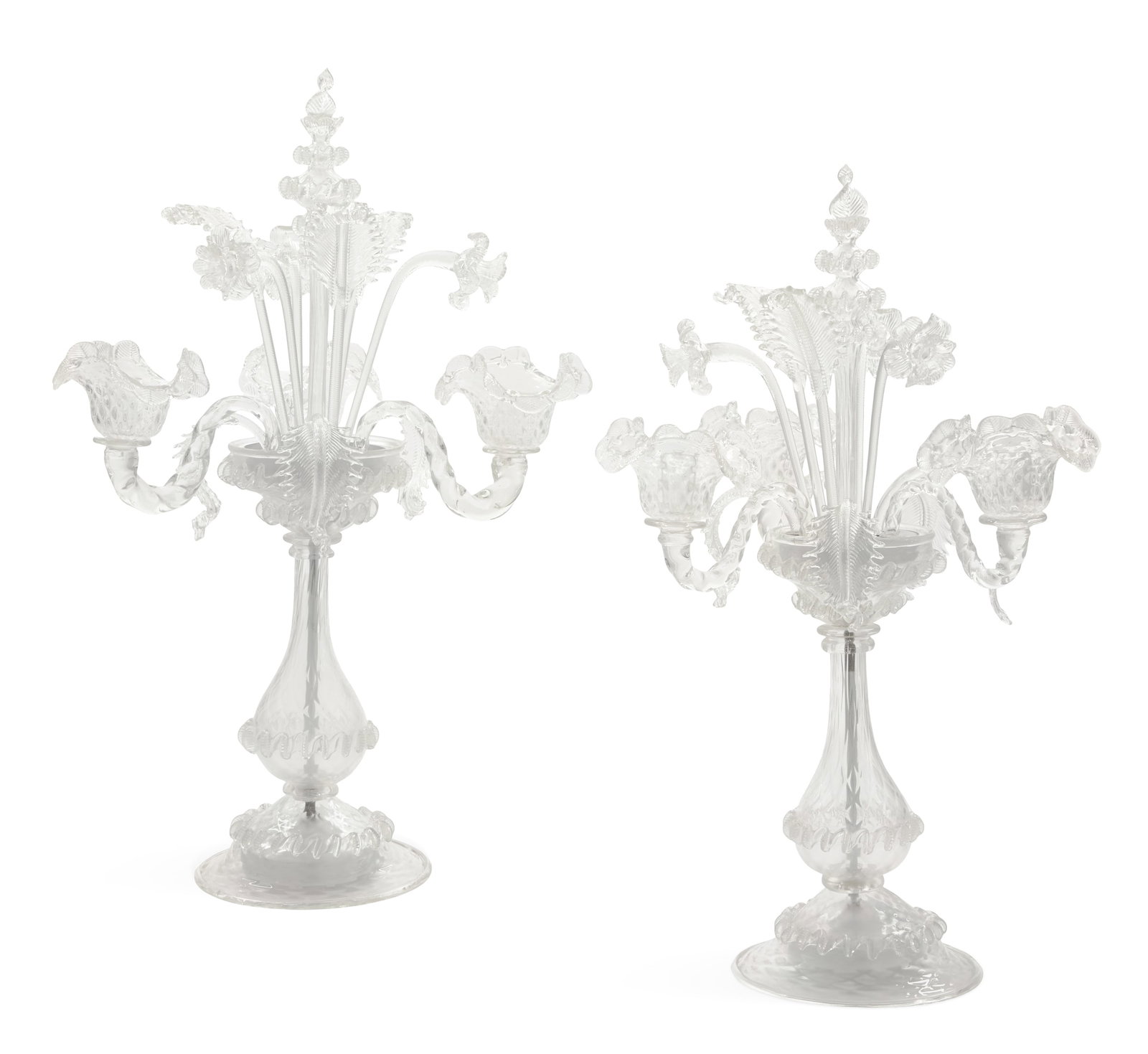 Pair of Murano Glass Candelabra: Pair of Murano Glass Candelabra 20th century, Venice, Italy, with "Ca Rezzonico"-style floral decoration, with blown flowers and leaves in the center, the scrolled candle arms terminating in quilted c