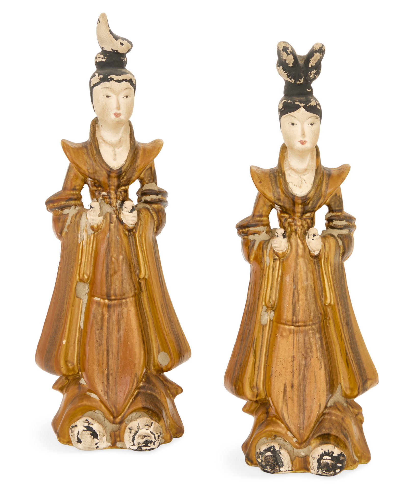 Pair of Chinese Sancai-Glazed Mingqi Figures: Pair of Chinese Sancai-Glazed Pottery Mingqi Figures 20th century, the court attendants in dramatic dress with distinctive hairstyles and foot coverings. h. 13-1/2", w. 4-3/4", d. 3-1/4" Provenance: T