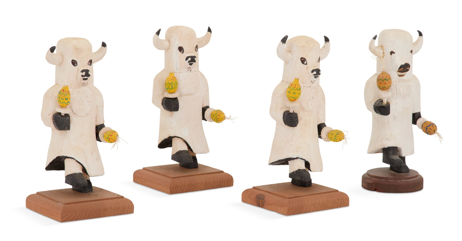 Hurley Hugh Gautreaux (US/Louisiana, 1932-2020): Hurley Hugh Gautreaux (American/Louisiana, 1932-2020) "Kocha Mosairu Mana, White Buffalo Maid", 2010 four carved and painted wood figures each signed, and three titled and dated en verso of base.