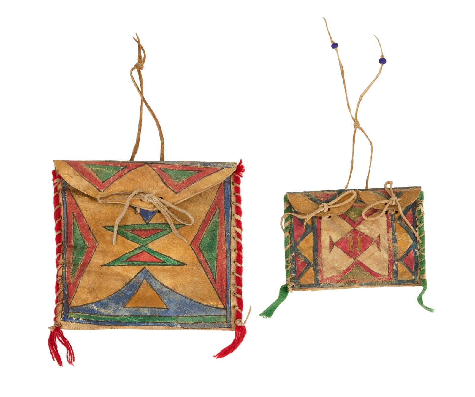 Two Native American Rawhide Parfleches: Two Native American Rawhide Parfleches 19th century, likely Apache, with bold, bright geometric decoration. h. 3-1/2", w. 5-1/4" and h. 6-1/4", w. 7" Provenance: The collection of Norbert Deshotels,