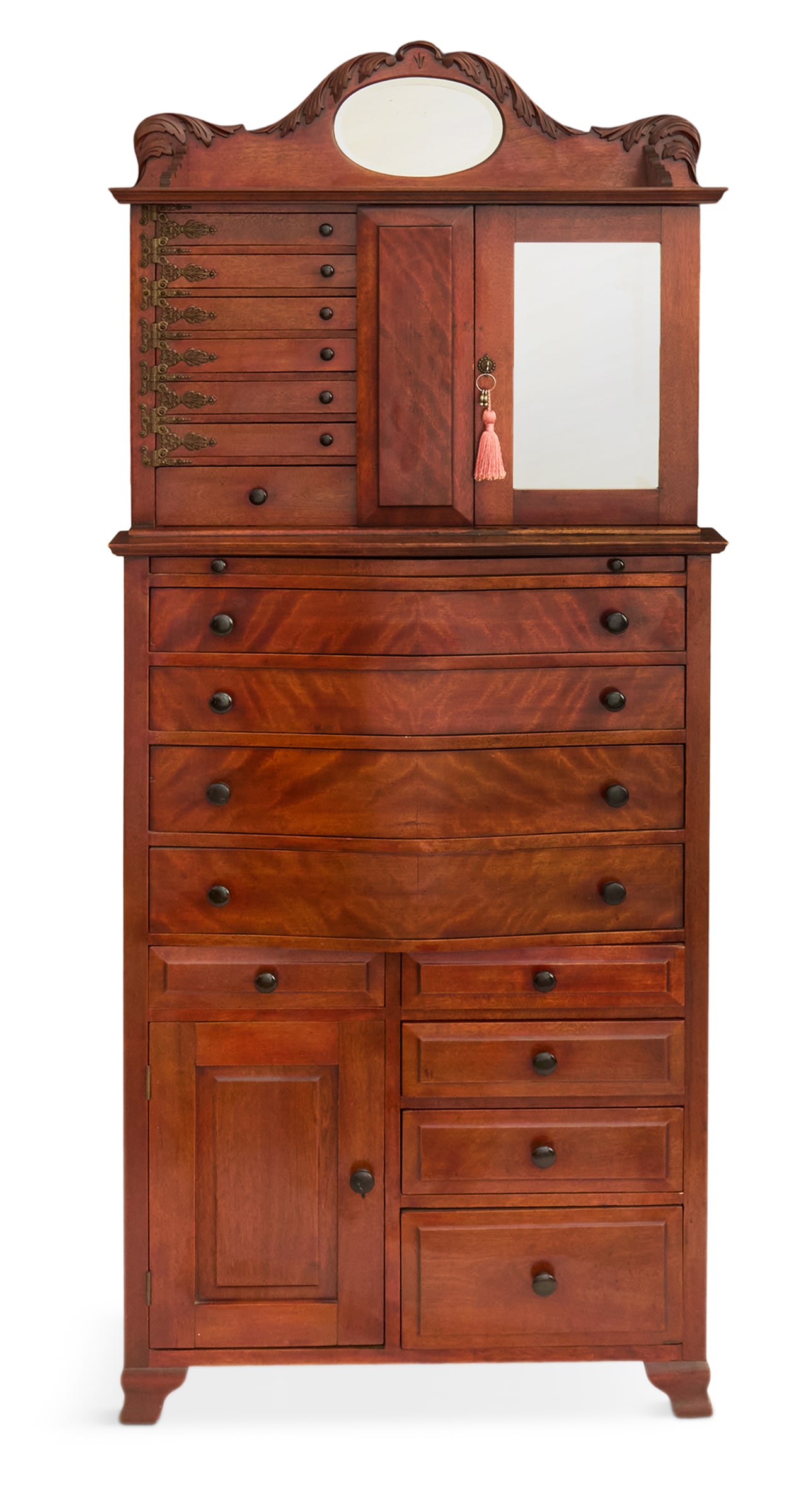 American Flame-Grain Birch Dental Cabinet: American Flame-Grain Birch Dental Cabinet ca. 1900, of diminutive scale, with an oval beveled mirror crest above a recessed section of seven drawers and a mirrored cabinet, the serpentine base with a