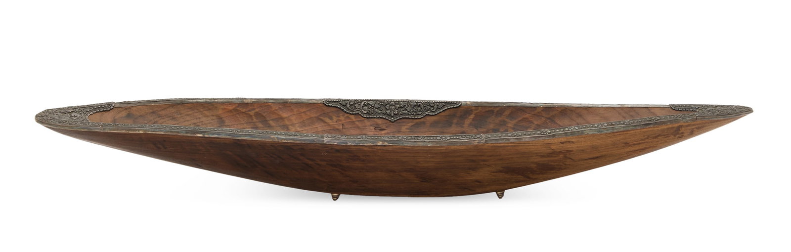 Indian Silver-Mounted Teak Bowl: Indian Silver-Mounted Teak Bowl the carved teak bateau-form oblong bowl with edges mounted with silver repousse. h. 4-1/2", w. 42", d. 11-1/2"