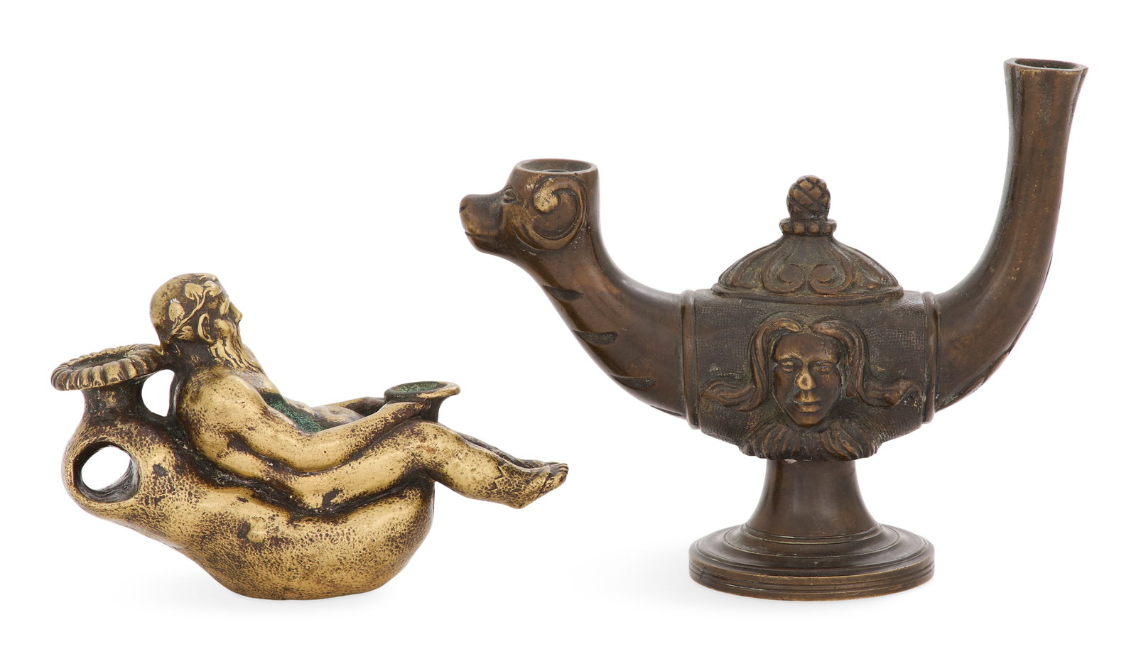 Two Italian Grand Tour Bronze Oil Lamps: Two Italian Grand Tour Bronze Oil Lamps 19th century, including a patinated bronze example with a dog's head on the "flame" end and a satyr masque on the body, h. 5-3/4", w. 7", d. 2-3/4", and a polis