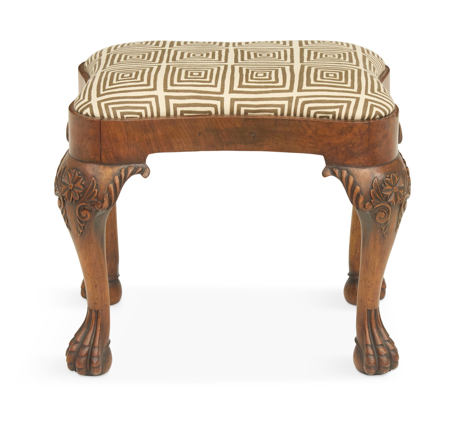 Irish Walnut Footstool: Irish Walnut Footstool 19th century, in the George III taste, with a serpentine-form slip seat, raised on cabriole legs with carved knees and paw feet. h. 18", w. 22", d. 16"