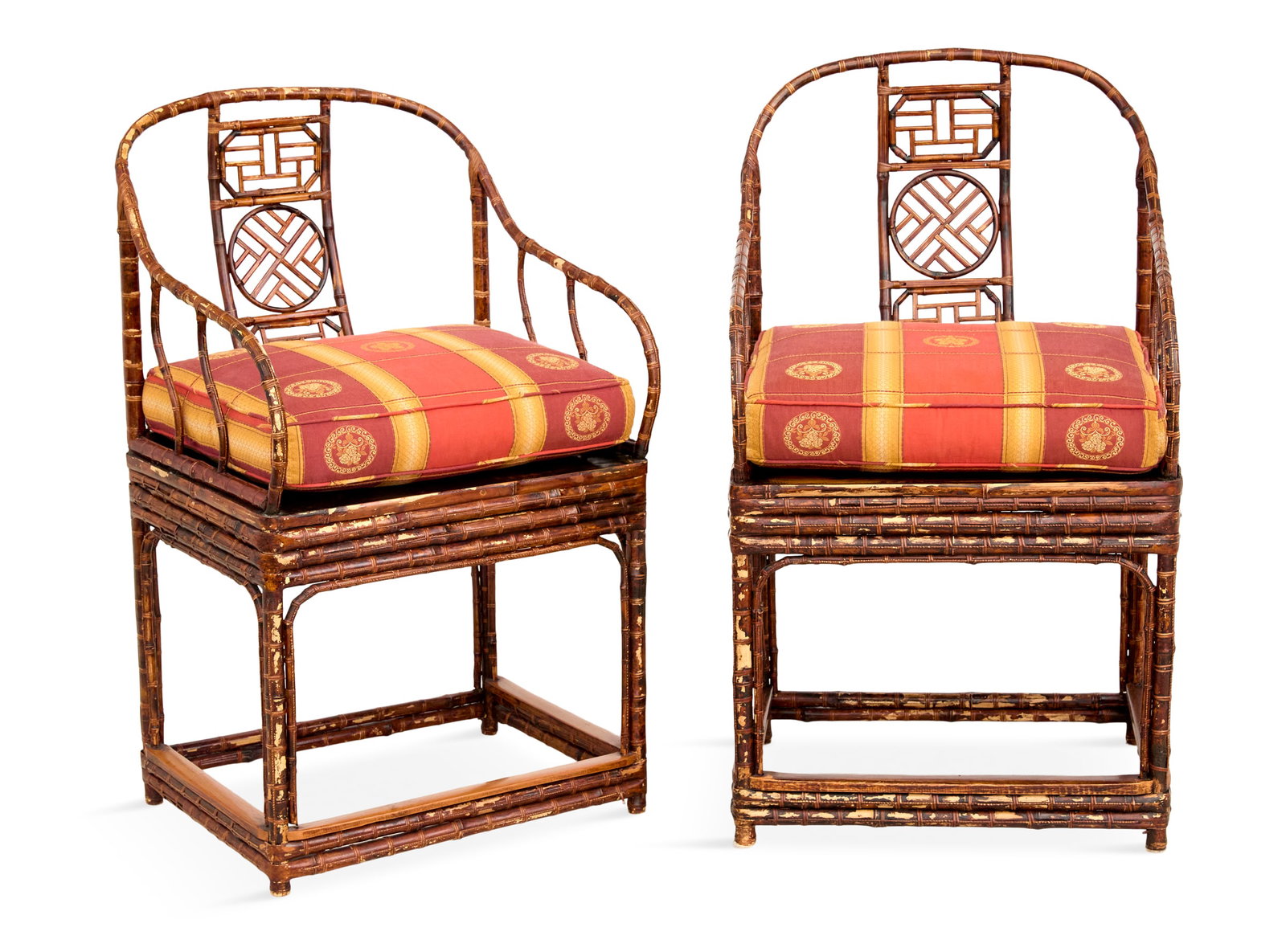 Pair of Chinese Export Bamboo Armchairs: Pair of Chinese Export Bamboo Armchairs 20th century, each with a cane-wrapped bamboo frame, the backs with pierced medallions, with loose cushions. h. 40", w. 22-1/2", d. 20" Provenance: Yau Arts,